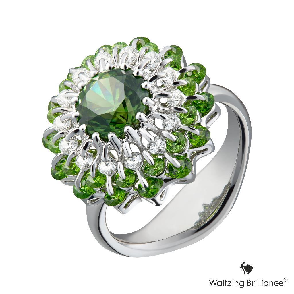 2.18ct Russian Demantoid Garnet is mounted in the innovative diamond jewellery design inspired by famous ballet. The strong fire coming from the natural Demantoid shines even more brighter by surrounding swirling diamonds and the flawless graduation