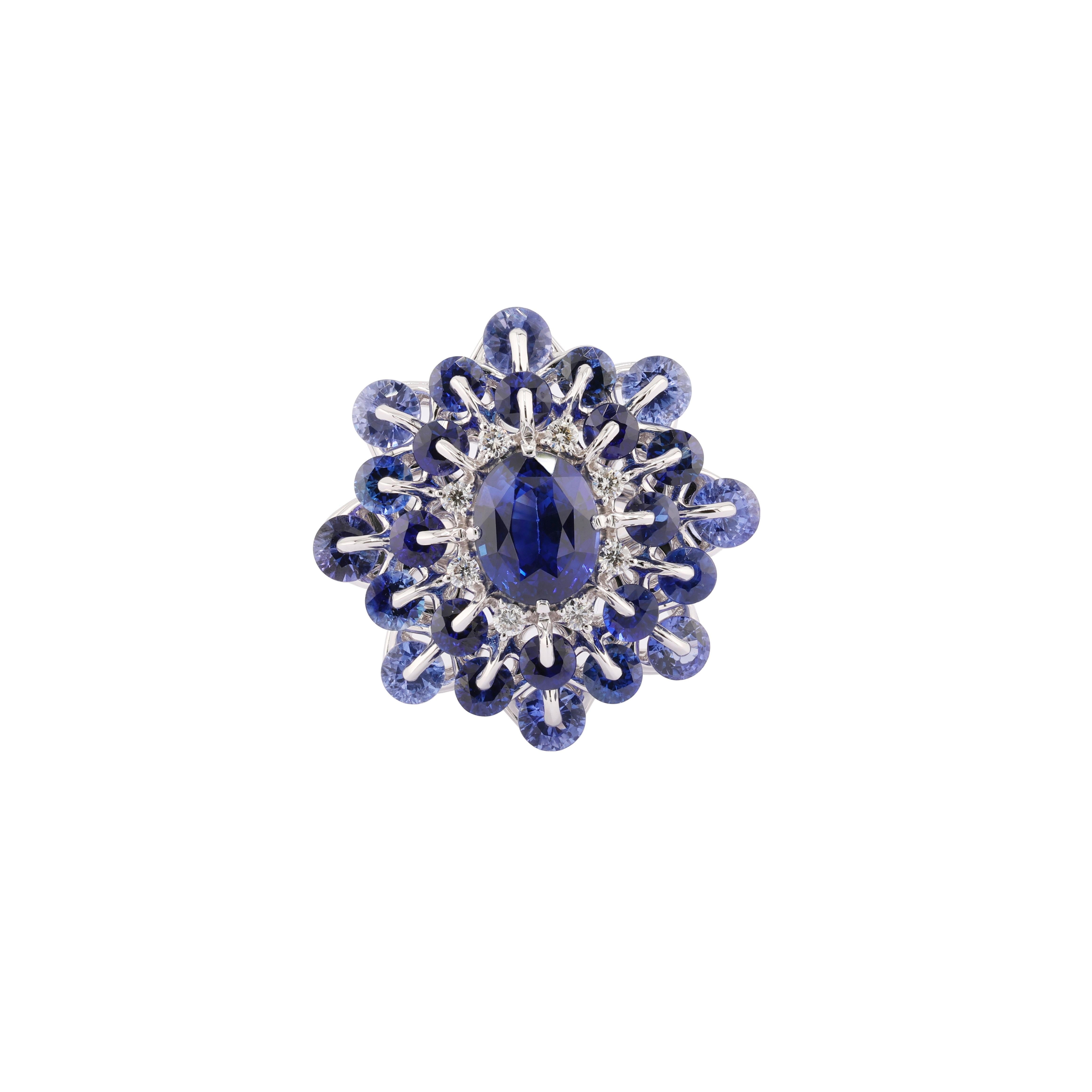 MOISEIKIN's mesmerising sapphire ring with total 4.89ct Blue sapphire, decorated with diamonds and matching blue sapphires, captures the eye and radiates elegance and sophistication.
Inspired by the gorgeous evening Ball dress, the ring is