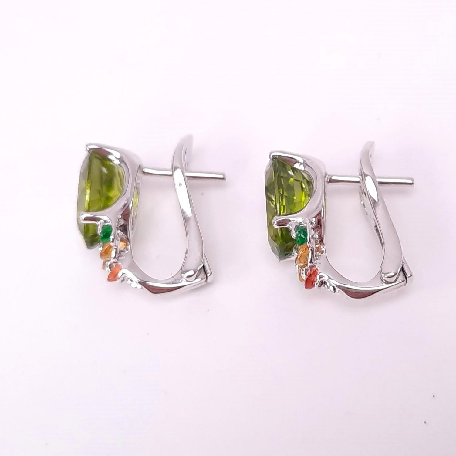 Crafted to perfection, MOISEIKIN's colourful earrings  from the Tsvetodelika collection are made with vibrant vivid peridots, diamond-cut golden sapphires and tsavorite using the patented technology that would captivate your heart and add colours to
