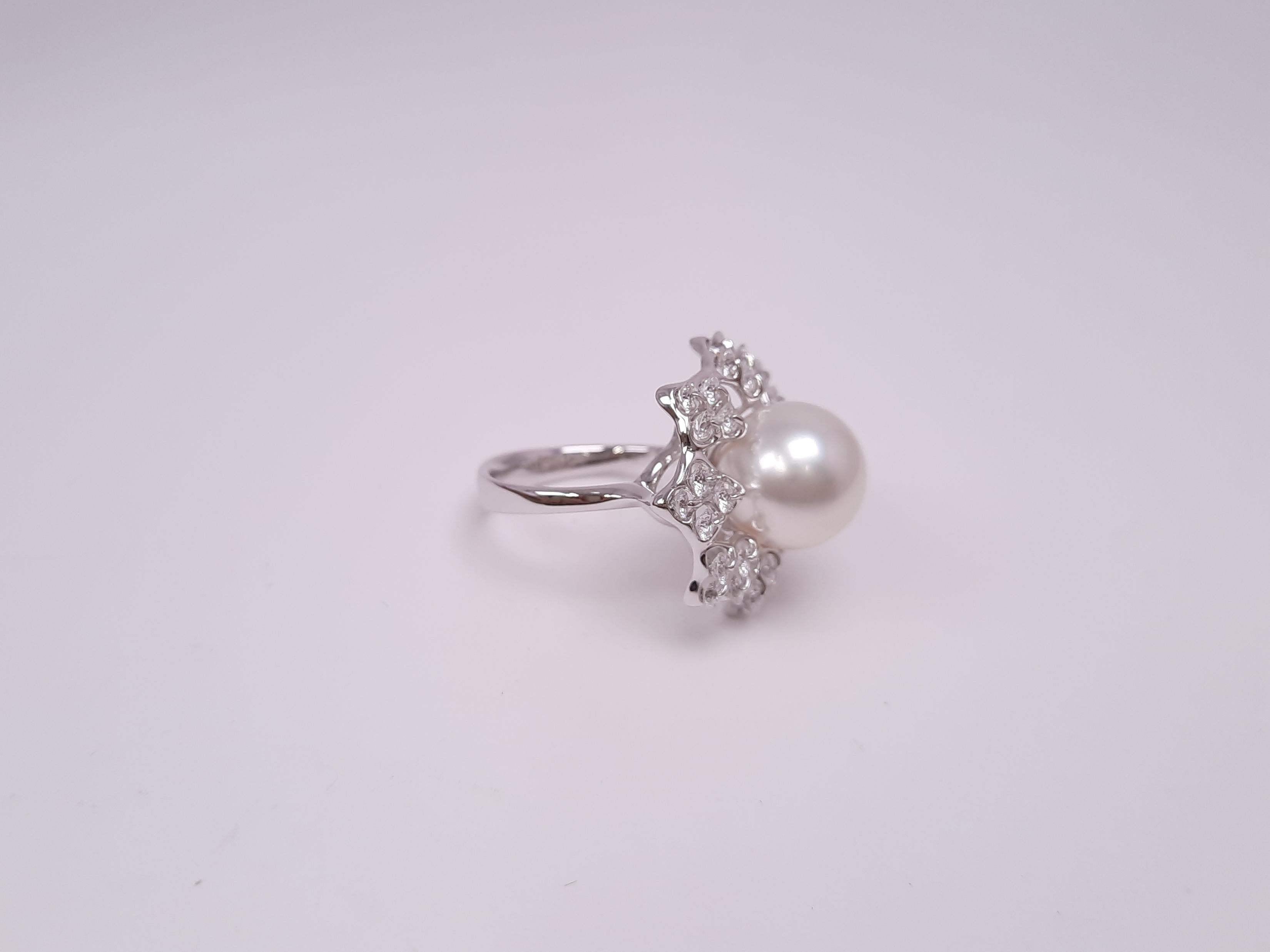 The top quality 11-12mm round South Sea Pearl is elegantly mounted in our unique jewellery setting, Waltzing Brilliance. On the ballet tutus -like design frame, high quality diamonds swirl 360 degrees on the setting just like graceful ballerinas.