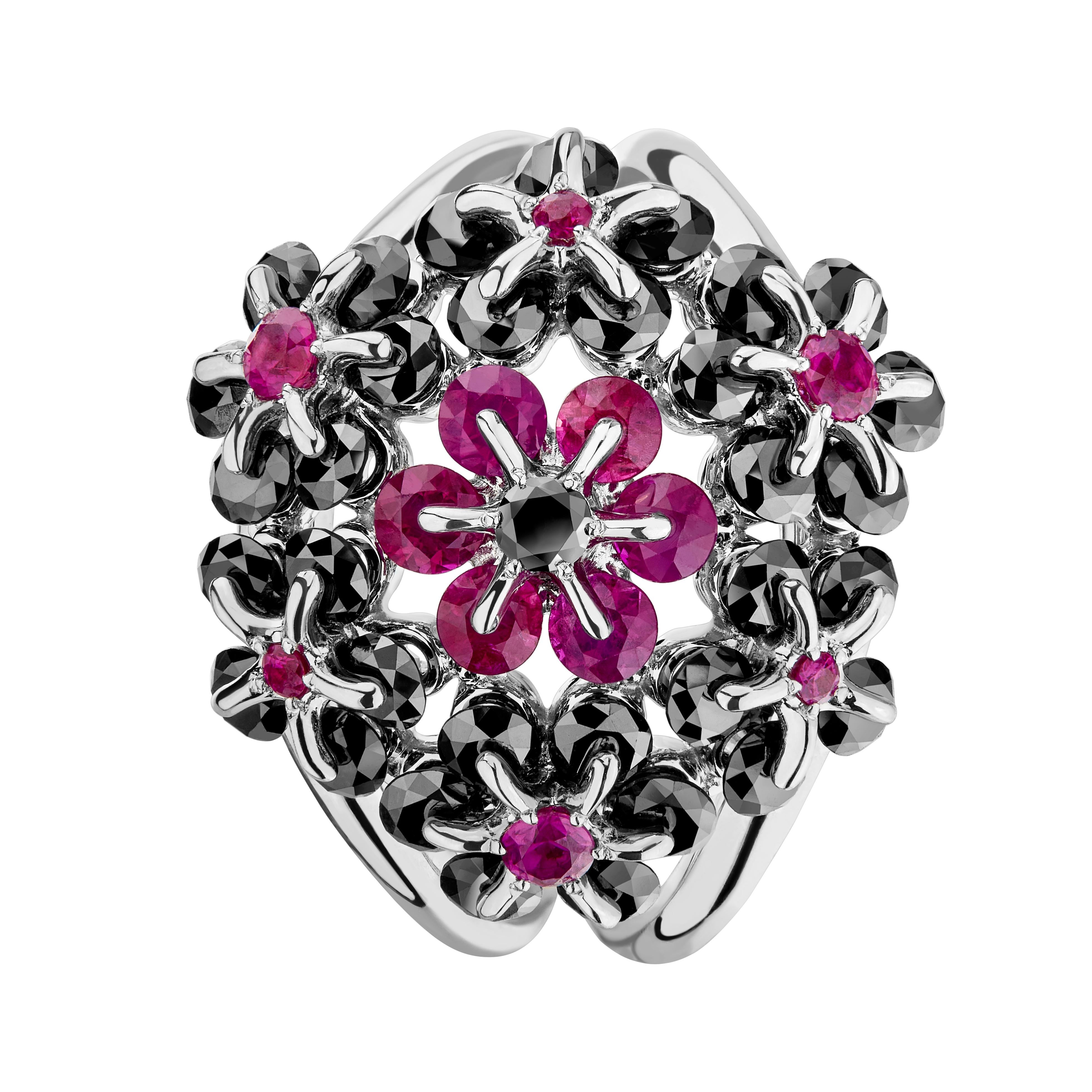 Diamond-cut rubies, white and black diamonds are mounted carefully in delicate flower design, employing innovative technology. Inspired by a graceful ballerina, every gem sparkles and dances  on your finger. Black and red gems are always  attractive