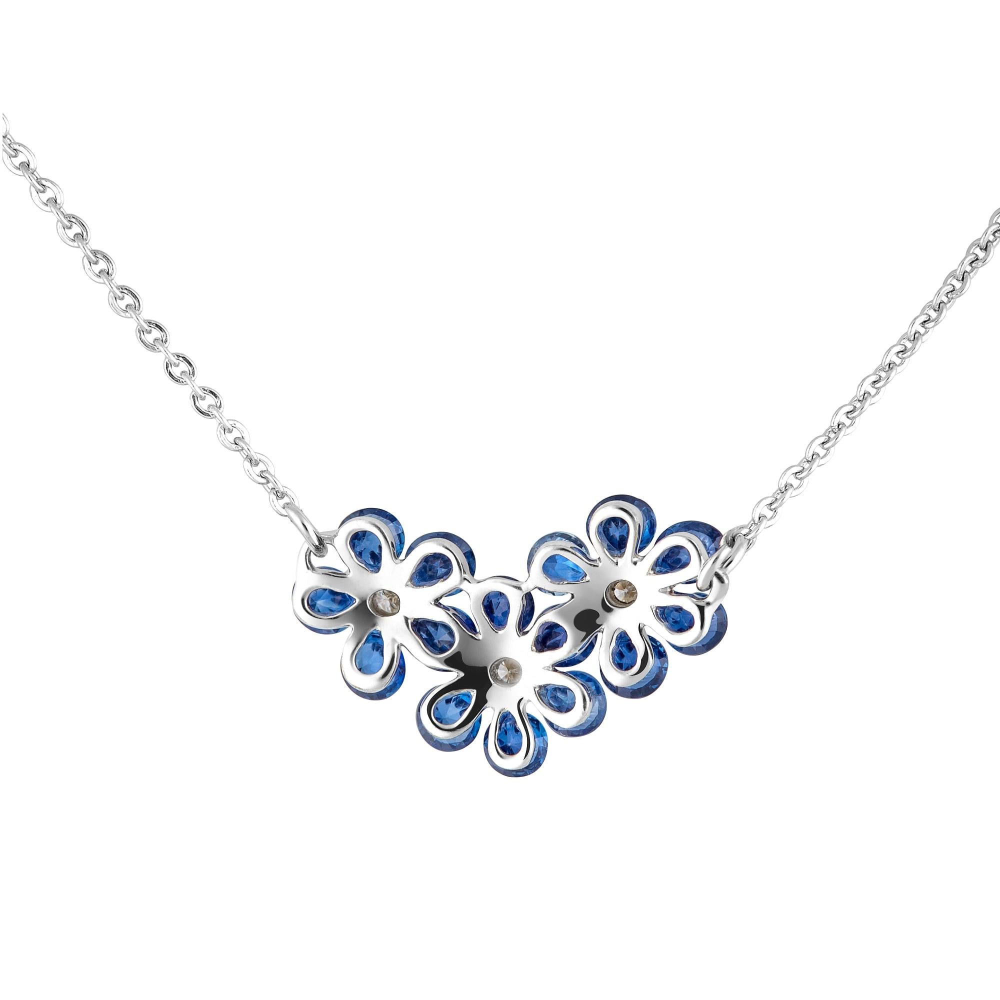 Diamond-cut blue sapphires are mounted carefully in delicate flower design, employing innovative technology.  

Internationally patented, Waltzing Brilliance technology is an innovative jewellery invention patented by a leading International
