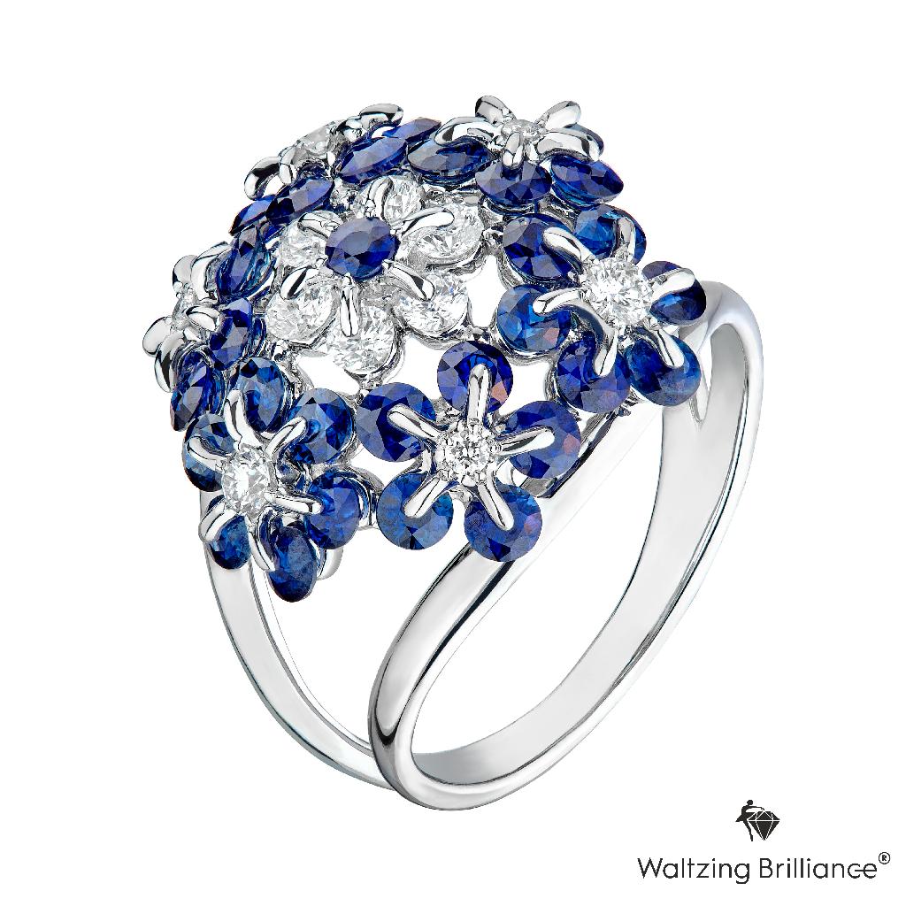 Diamond-cut blue sapphires are mounted carefully in delicate flower design, employing innovative technology. Inspired by a graceful ballerina, every gem sparkles and dances  on your finger without anything to be hidden. 

Internationally patented,
