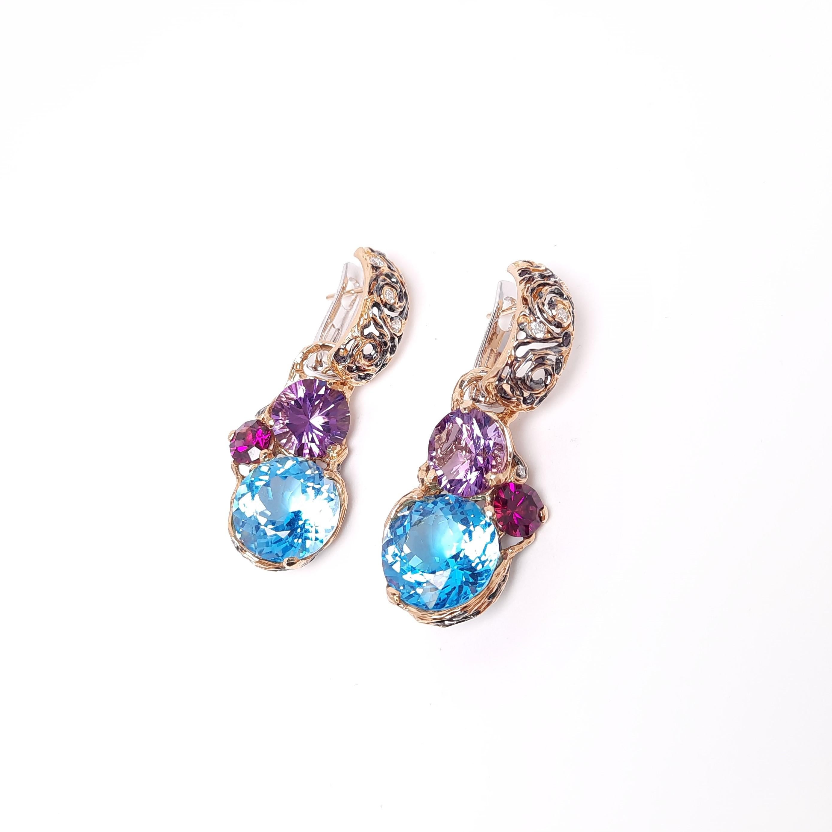 Inspired by Impressionism and Vincent Van Gogh's artistic paintings, MOISEIKIN created a starry night motif, handmade earrings with gold, diamonds, and multi-facet semi-precious stones such as Amethyst, Topaz, and Rhodolite. The colourful facetted
