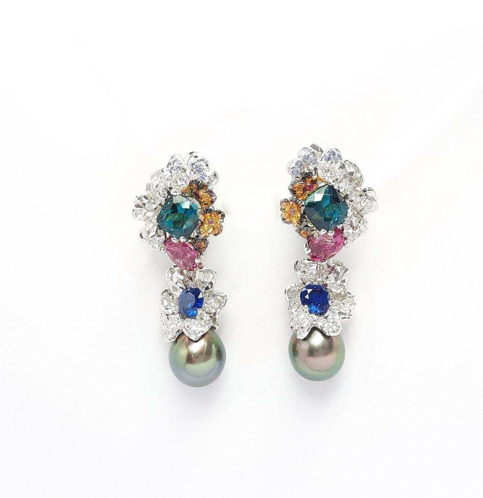 Inspired by Impressionism, MOISEIKIN® has created a blooming flower earrings  in tridimensional manner. Trembling flowers and sweet fragrance of coming ripe fruits are embodied  in gems and metals. Inside diamond flowers petals are rare indigo blue
