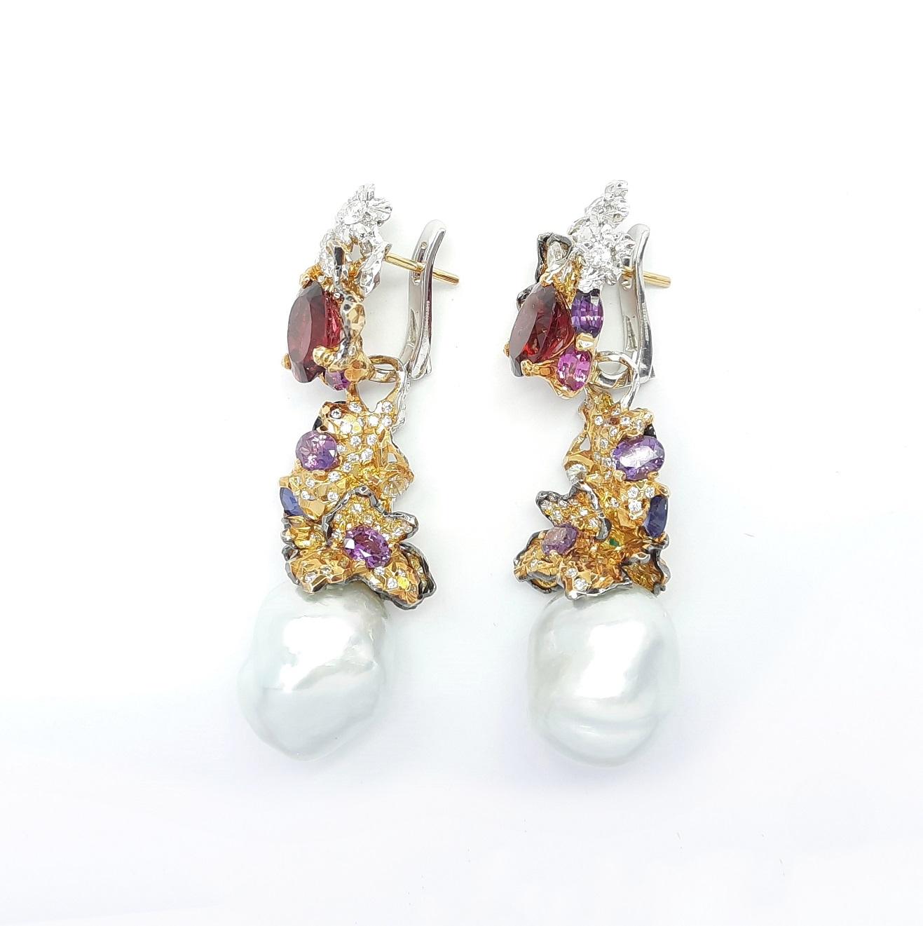 Inspired by Impressionism, MOISEIKIN® has created a blooming flower earrings  in tridimensional manner. Trembling flowers and sweet fragrance of coming ripe fruits are embodied  in gems and metals. Inside diamond flowers are vivid rubellite