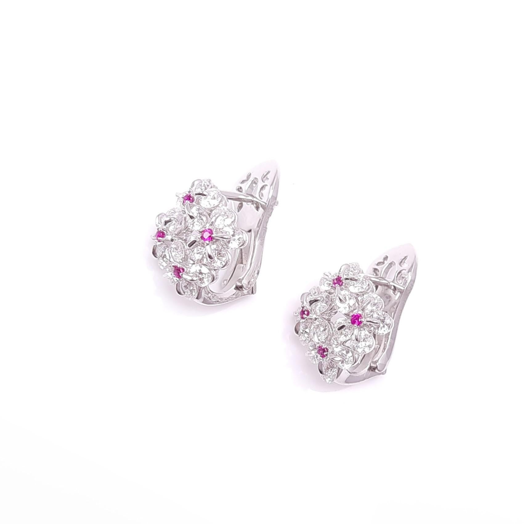 The innovative Russian setting Waltzing Brilliance breaths life into a jewel, making the earring more airy and sparkling!
Diamonds are mounted in a delicate flower design. Thanks to the innovation, the stones tremble and rotate as you move as if