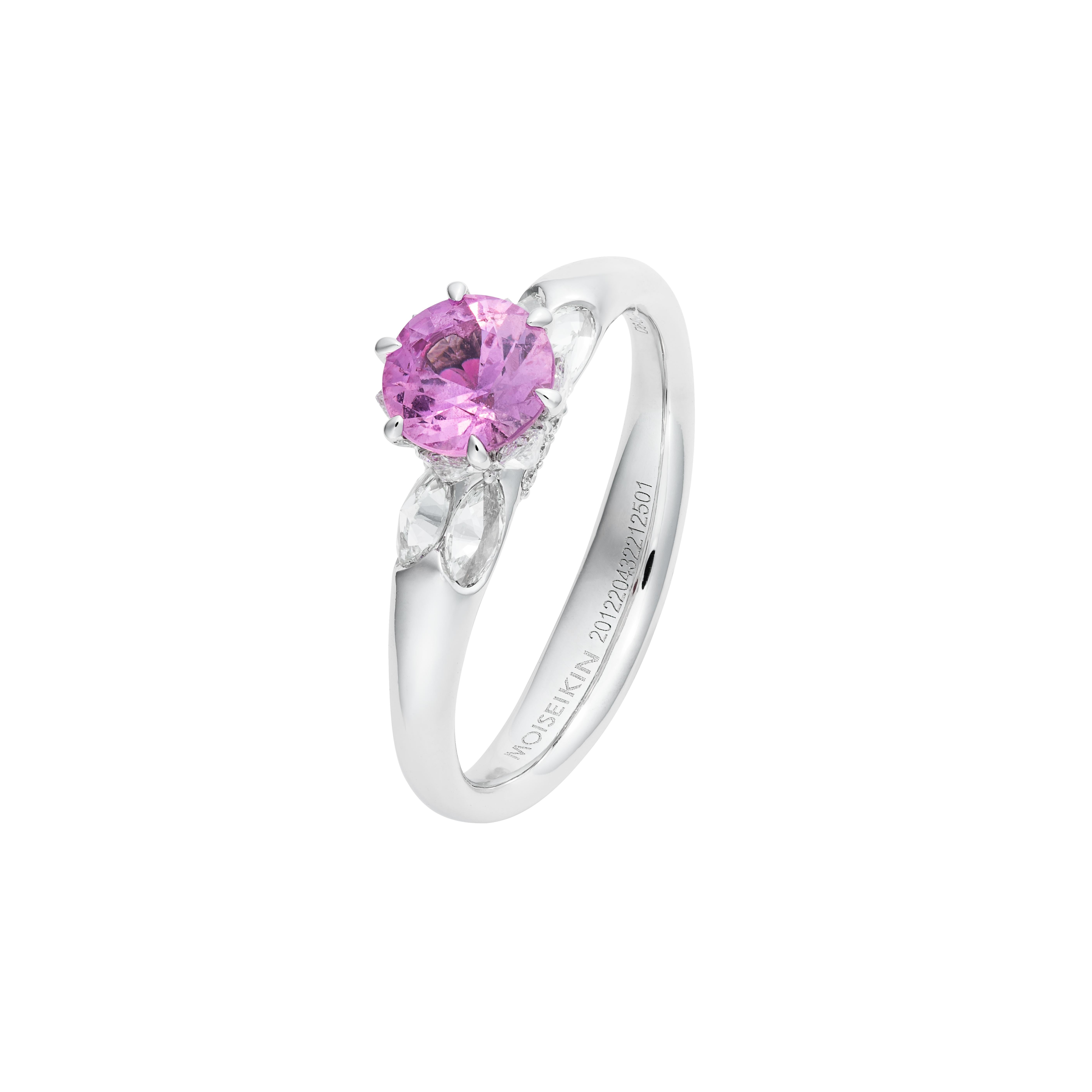Made from 18K white gold, the Lotus Ring from Moiseikin's Harmony of Water collection exudes elegance and grace.
At its heart lies a captivating 0.90ct pink sapphire, cradled by marquis diamond petals in a reverse setting. This unique technique