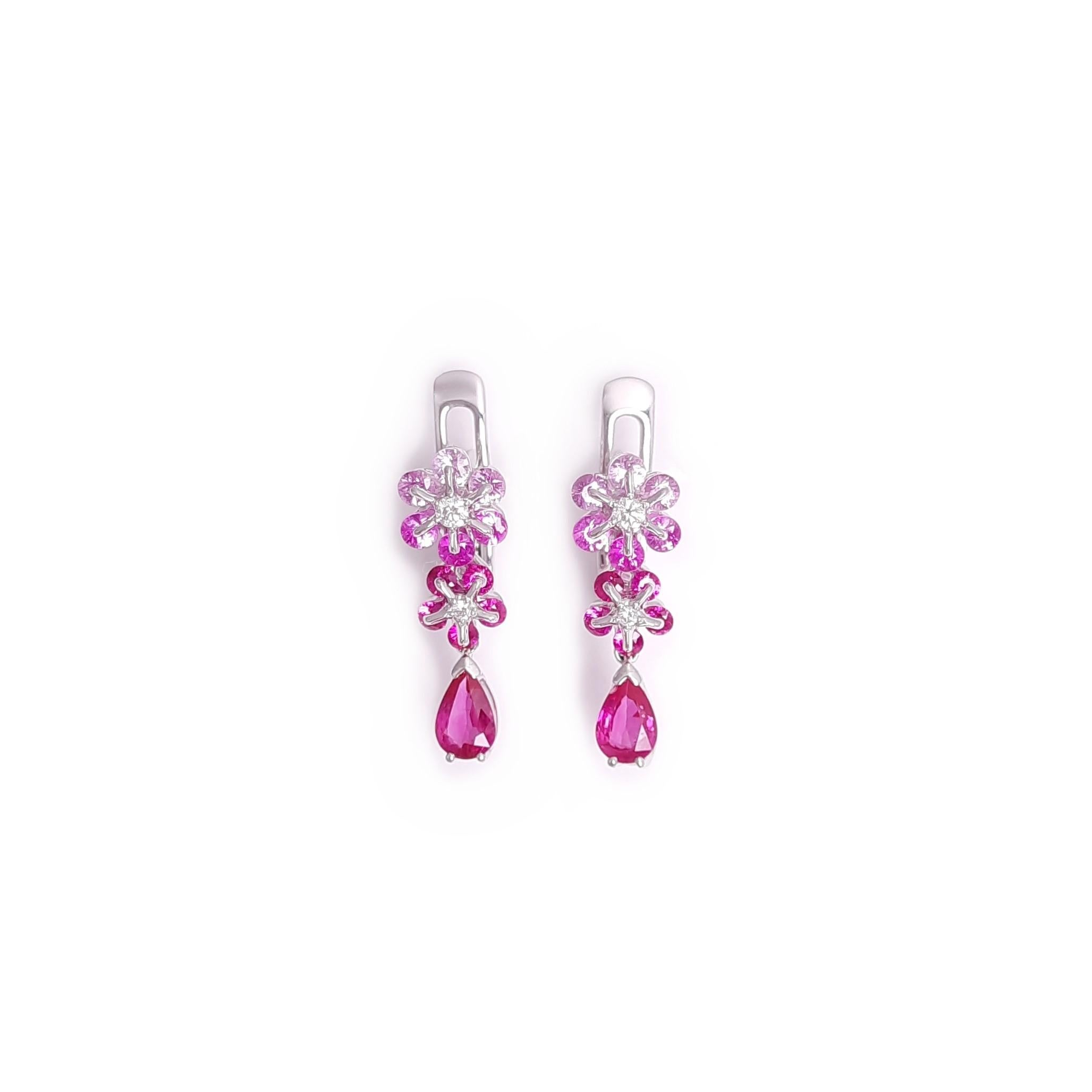 The innovative Russian setting Waltzing Brilliance breaths life into a jewel, making the earring more airy and sparkling!
A pair of rubies and the graduation of rubies and pink sapphires create a graceful harmony. Thanks to the innovation, the