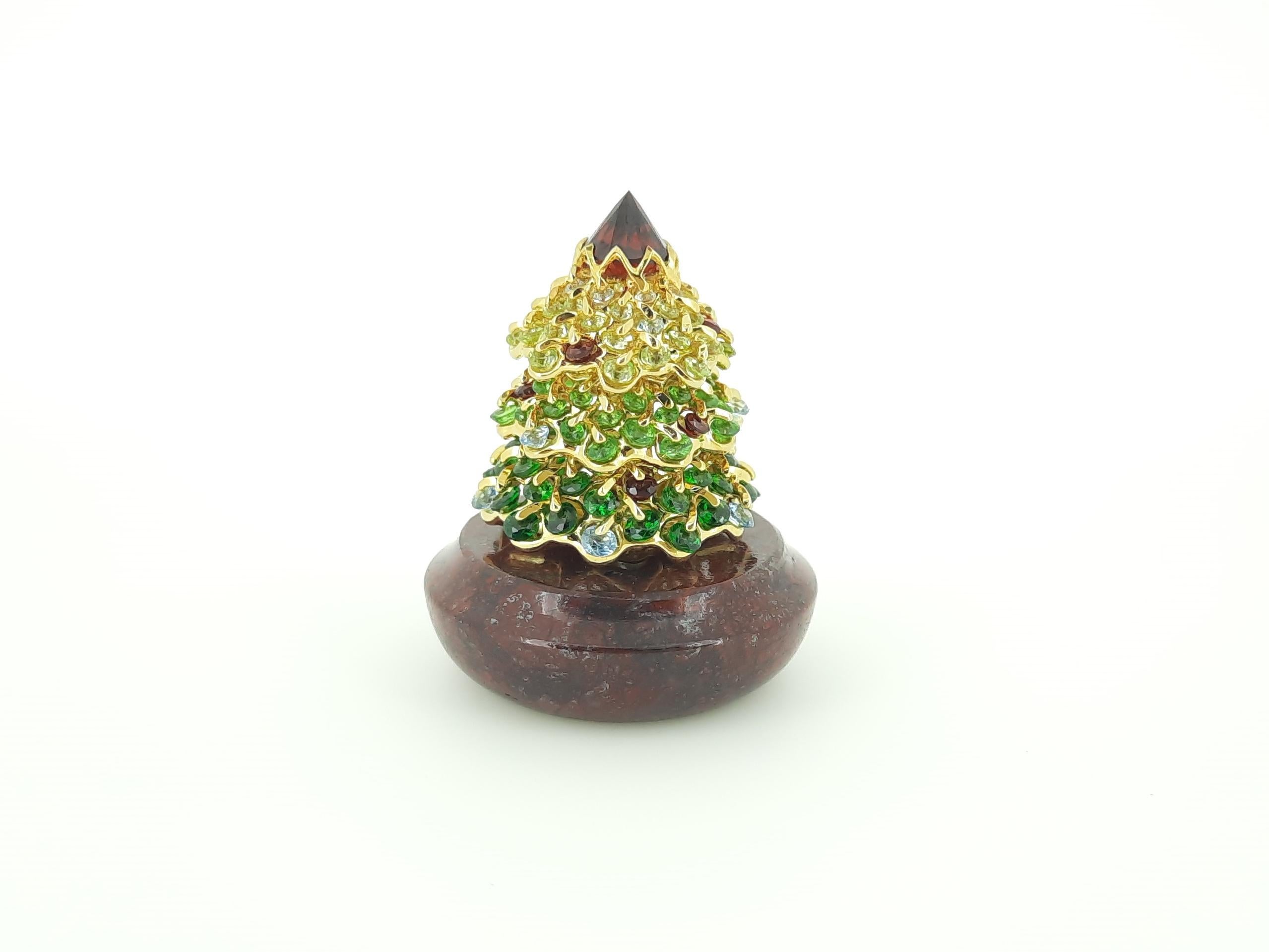 MOISEIKIN's Jewel Christmas Tree—a mesmerizing celebration crafted for the season of joy. This exquisite tree, silver gold-plated to perfection, stands as a refined desk accessory adorned with a magnetic base, ingeniously fashioned as a paper
