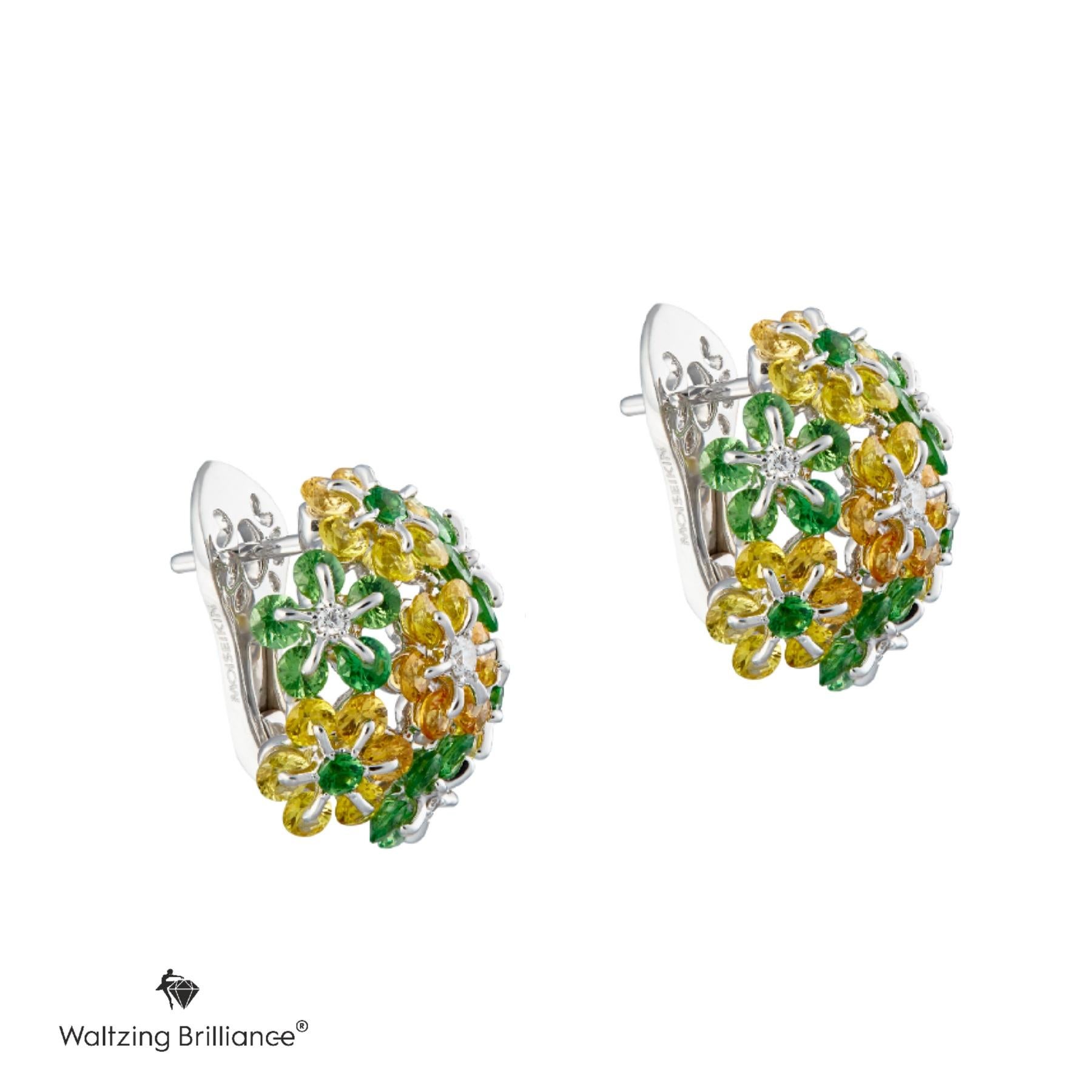 
The diamond-cut vivid tsavorite and golden sapphires harmoniously dance on the airy stage creating a magical glow as if reflecting the waltz of the post-summer heat and the autumn shine. The green tsavorites echo with warm, ripe sapphires. The