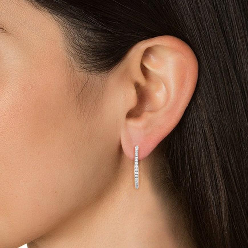 Moissanite C-Hoop Earrings in sterling silver. You shall need these hoop earrings to make a statement with your look. These Moissanite hoop earrings create a sparkling, luxurious look featuring 0.38 carats of moissanite.
Moissanite attracts luxury,