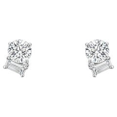 Moissanite toi and moi earrings in 14k gold