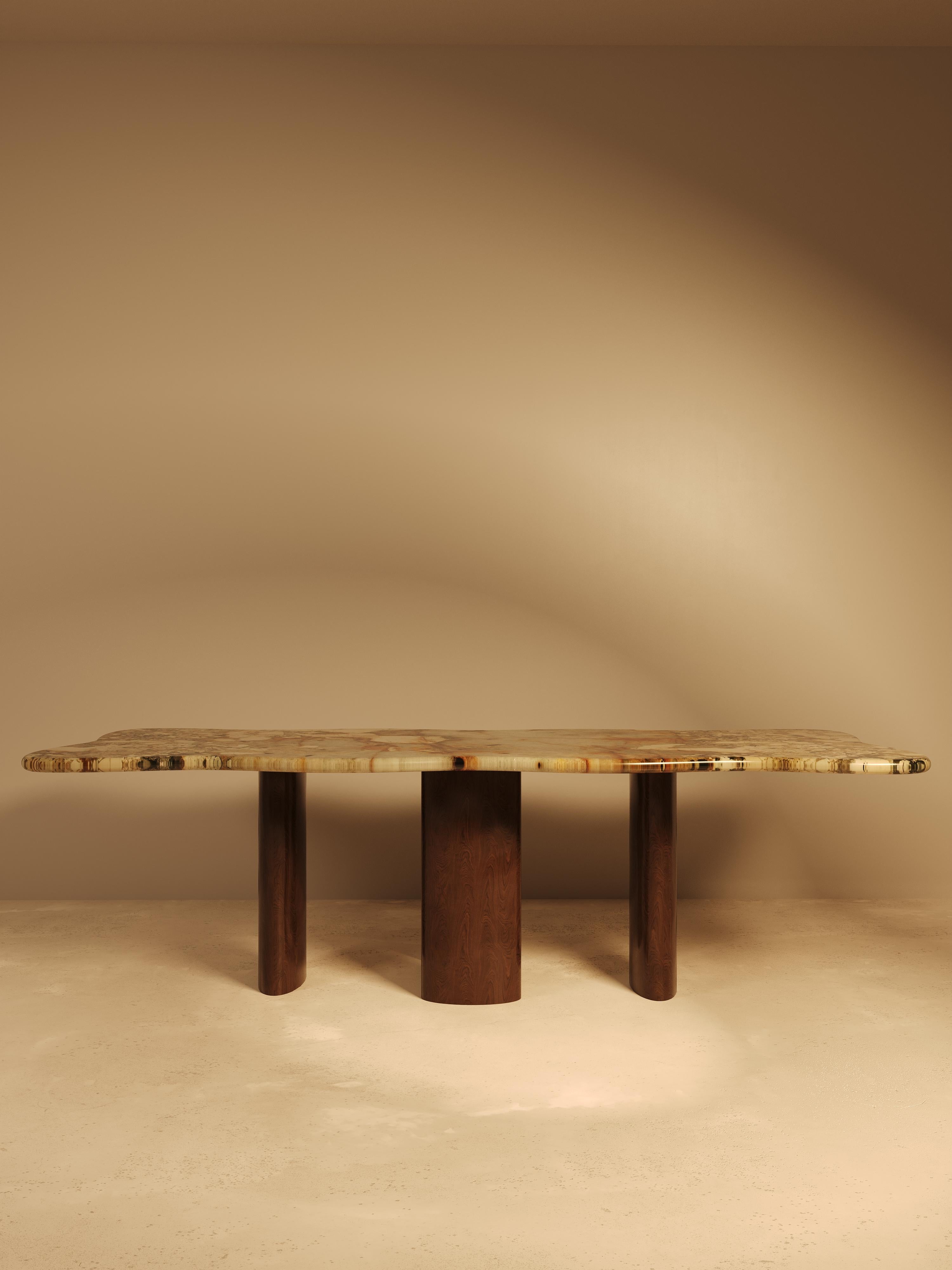 This sculptural dining table continues the narrative first introduced by our Nazar piece, reinterpreted here through a new language of materiality and proportion. The top is cut from Patagonia marble, a striking natural stone known for its