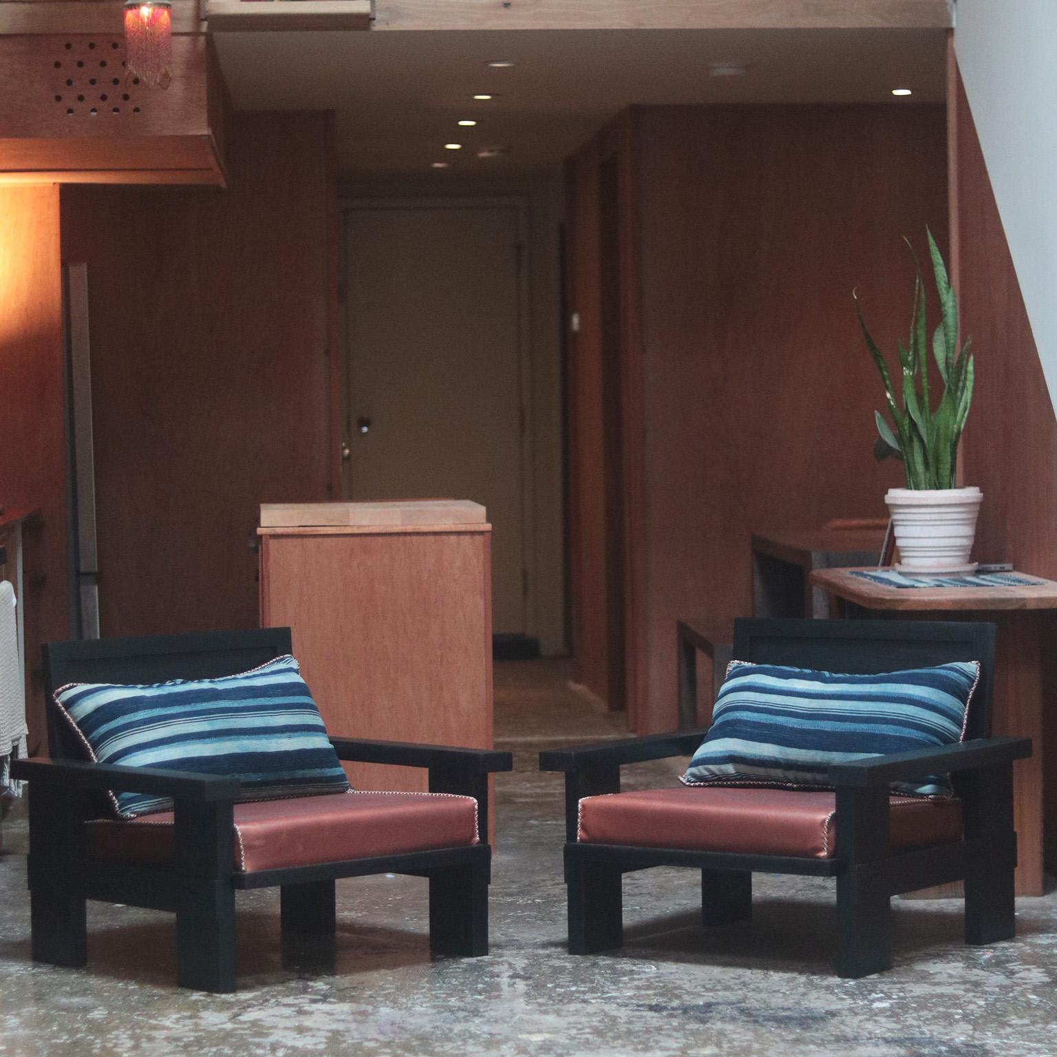 The Molana lounge chair is entirely handcrafted.  The frame is made from solid red oak wood that is finished in India with a satin top coat.  The chair also features beautiful and subtle wood joinery visible on the arms and outer assemble of the