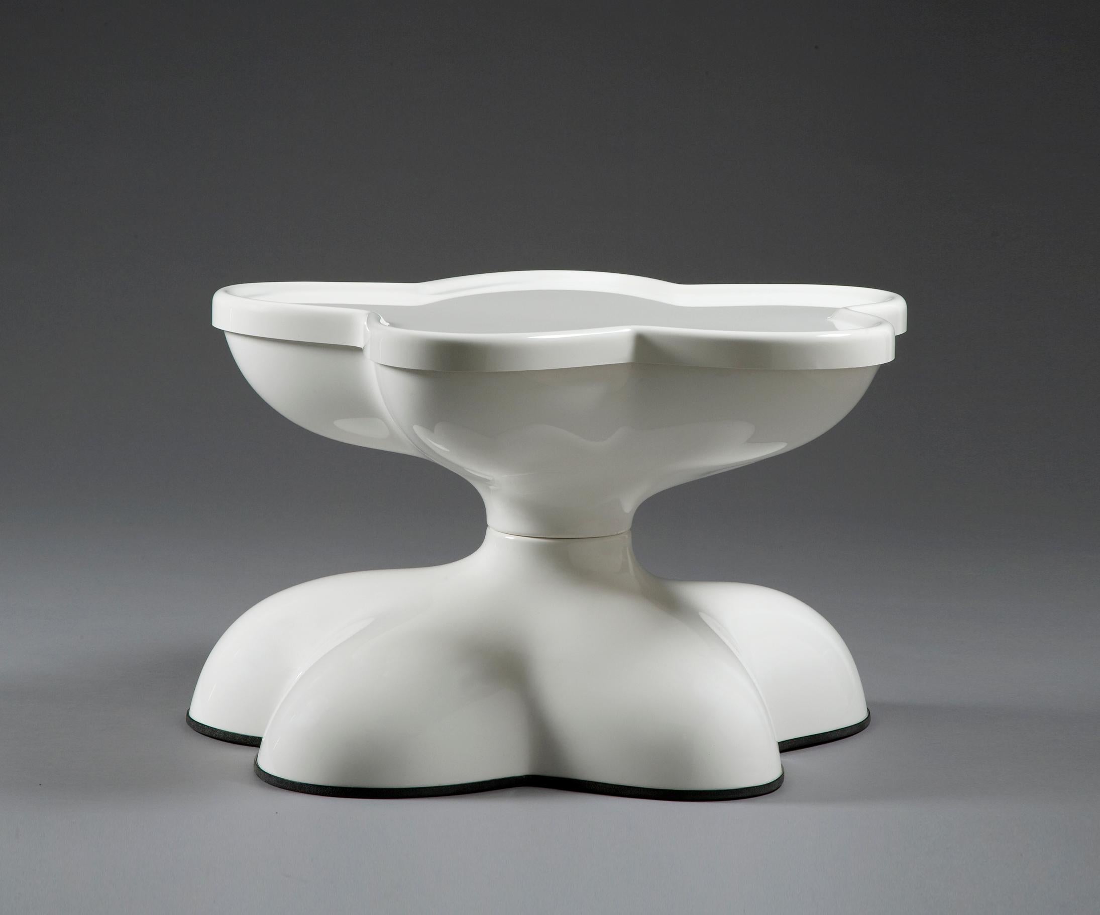Made to order white molar swivel coffee table in white gel-coated, fiberglass-reinforced plastic. Designed by Wendell Castle, Rochester, New York, 1969.

Please inquire for exact measurements.