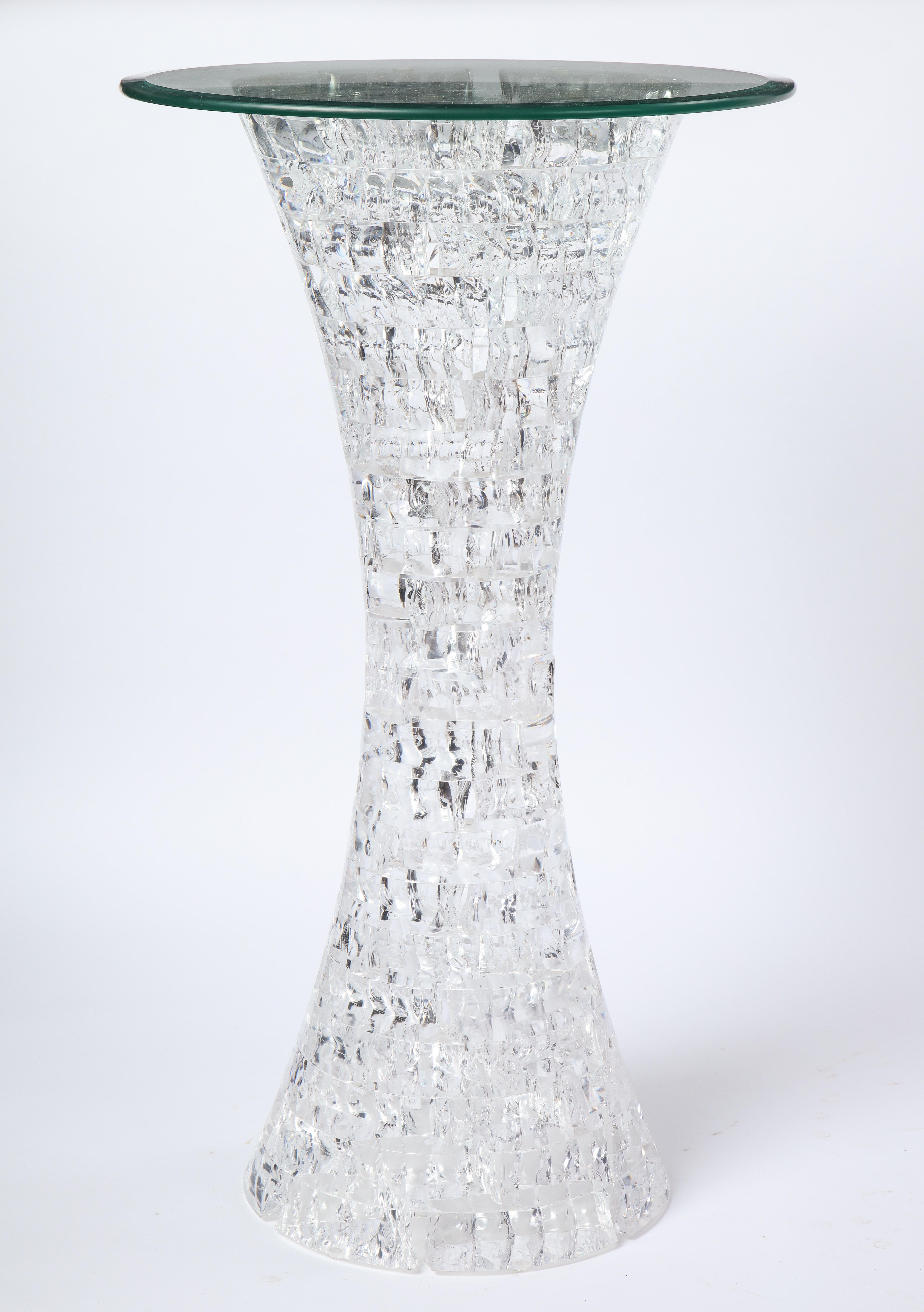 This 20th century molded Lucite side table comes from the collection of a New Yorker with connections to the top fashion design houses. The material Lucite debuted at the 1939 World's Fair and has since inspired countless designers from Gilbert