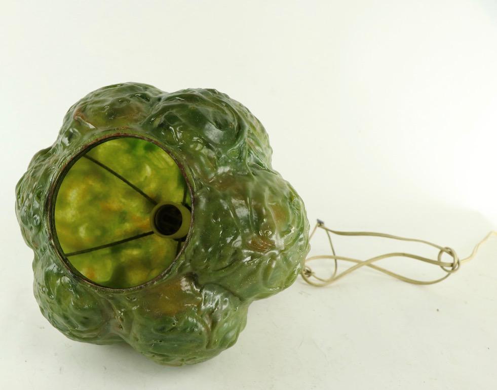 Unusual molded plastic ball fixture in the form of a head of cabbage by the Feldman Company. Weird and fun concept lights, in original, clean and working condition. Wired to accept standard size screw in bulbs. Priced and offered individually, but