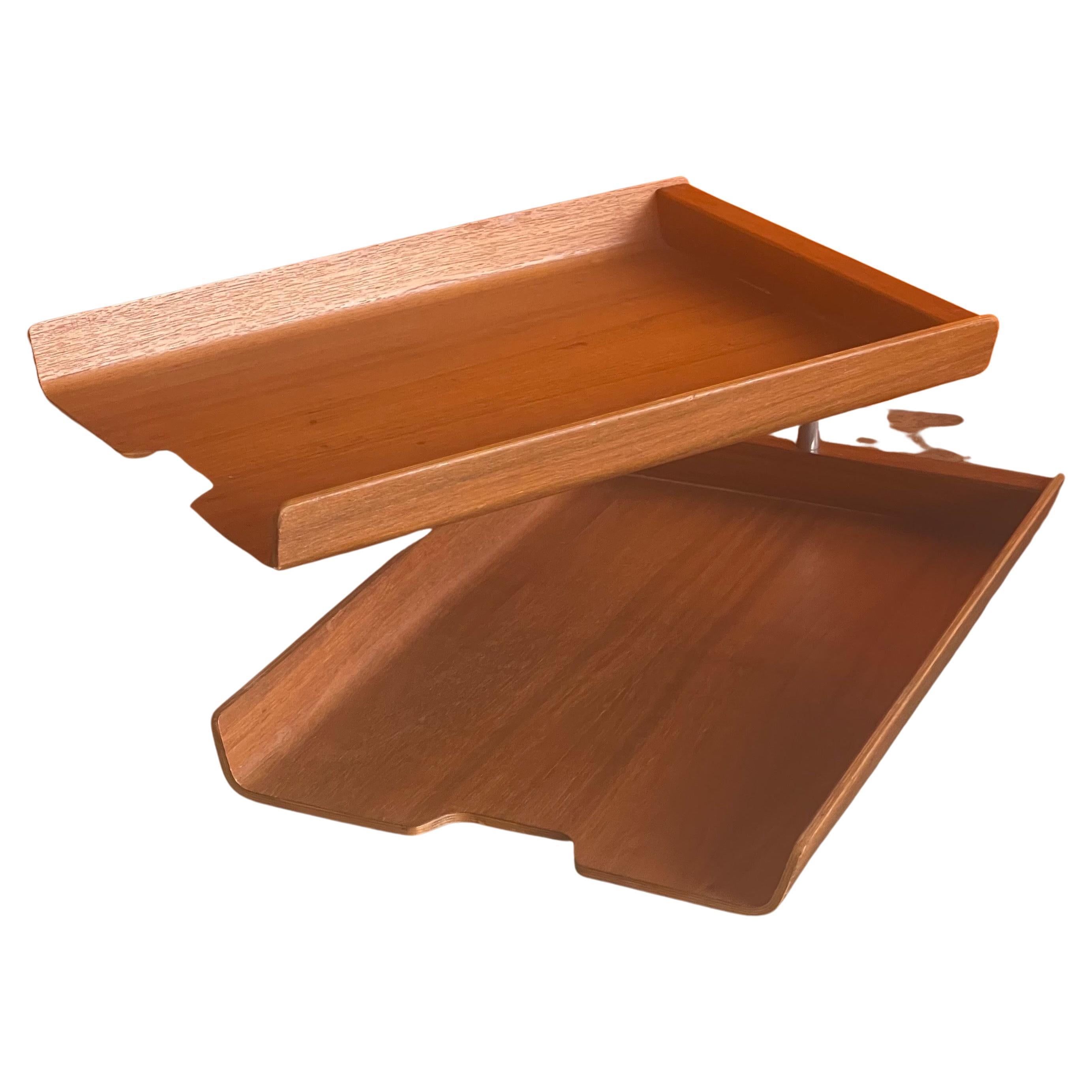 Very cool and functional double letter tray by Martin Aberg for Rainbow Wood Products Company of Sweden, circa 1970s. The trays are made of molded teak plywood and can swivel into any number of configurations to meet your office needs. The set is in