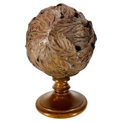 Vintage Molded terracota pine cone Art Deco on wooden base with leaf motif circa 1930