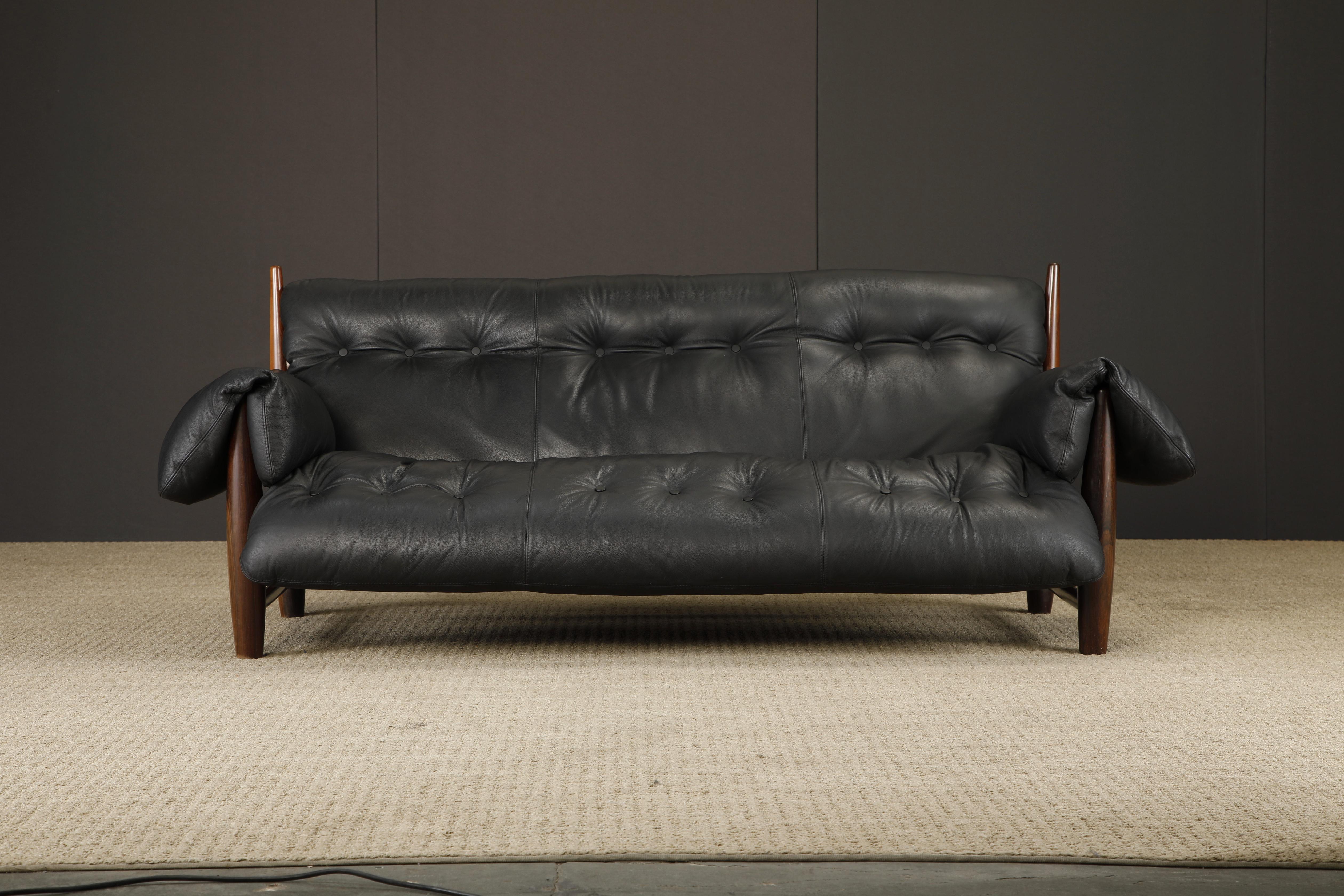 A rare signed example of the 'Mole' sofa by Sergio Rodrigues, produced by OCA Brazil in the 1960s (see image gallery for a photo of the OCA stamp). This Mole sofa has an expansive amount of valuable solid Brazilian Jacaranda Rosewood with deep vivid