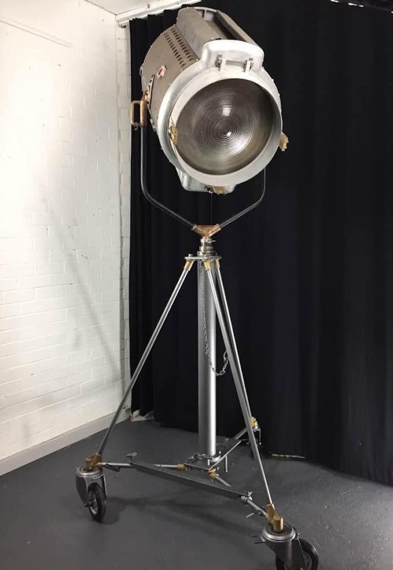 This is an original vintage industrial arc lamp made by Mole Richardson

History:
This genuine vintage Hollywood stage light (circa 1930s) are works of art that make a statement. The carbon arc light has Universal Studio markings on it,