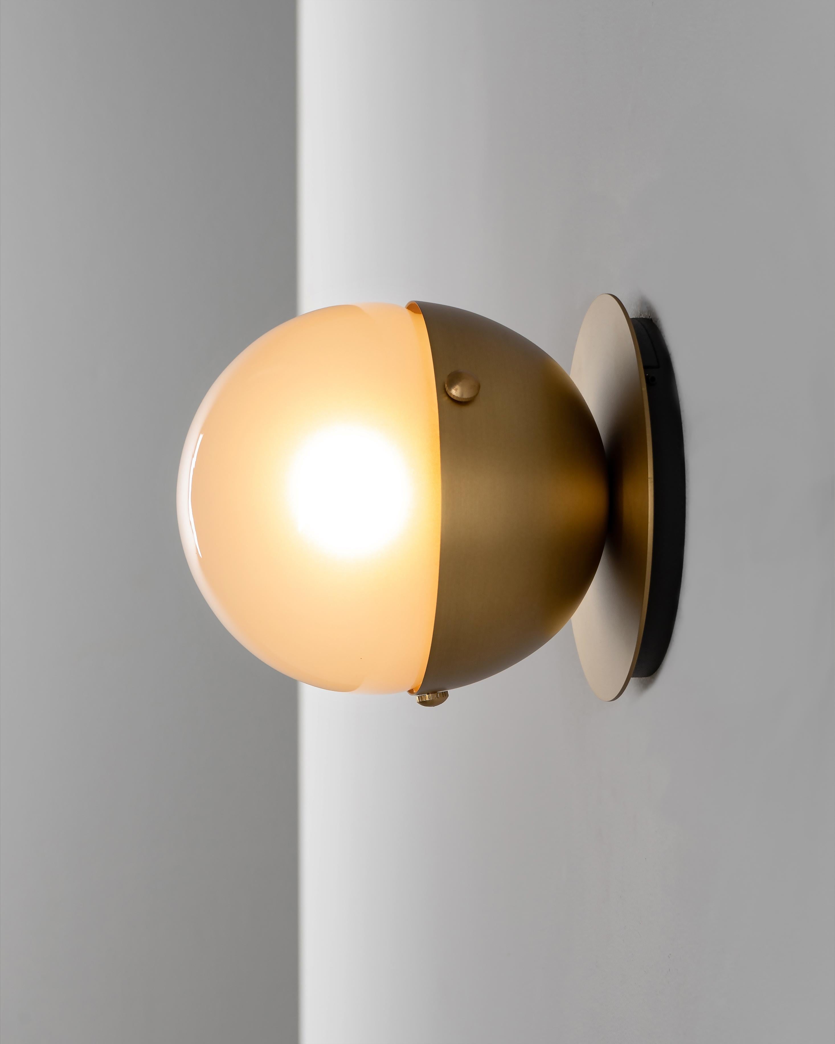 Molecule 1 Wall Sconce by Schwung
Dimensions: D 12.5 x H 14 cm
Materials: Brass, Glass, PN finish
Also Available: Black Gunmetal

Light Source

LED Bulb (included): 1 x 5 W
Max Wattage: 1 x 10 W
Total Lumens : 450-500 lm
Color Temperature: