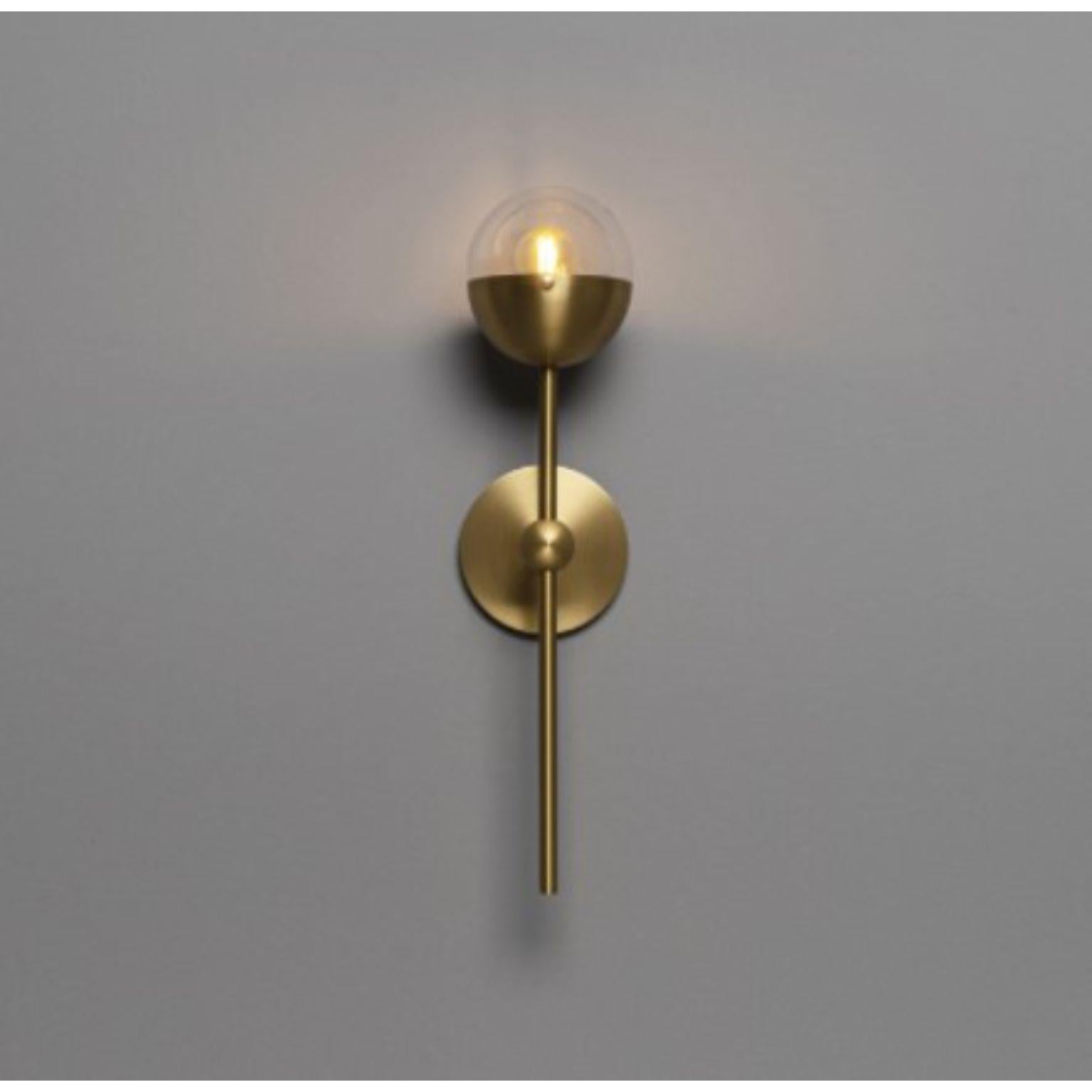 Molecule single wall sconce by Schwung
Dimensions: W 12.5 x D 14.4 x H 50.8 cm
Materials: Brass, opal glass
Weight: 1.7 kg

Finishes available: Black gunmetal, polished nickel, brass
Other sizes available.

 Schwung is a german word, and loosely