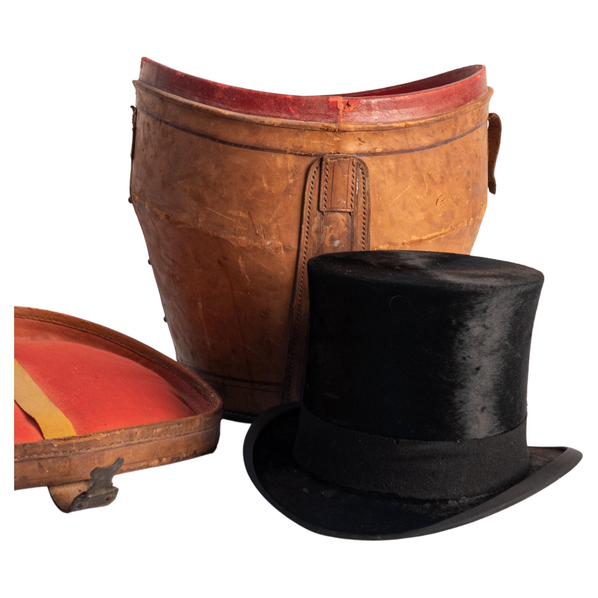 Chapeau haut de forme en moleskine, avec boîte à chapeau en cuir (fin 19e - début 20e siècle)