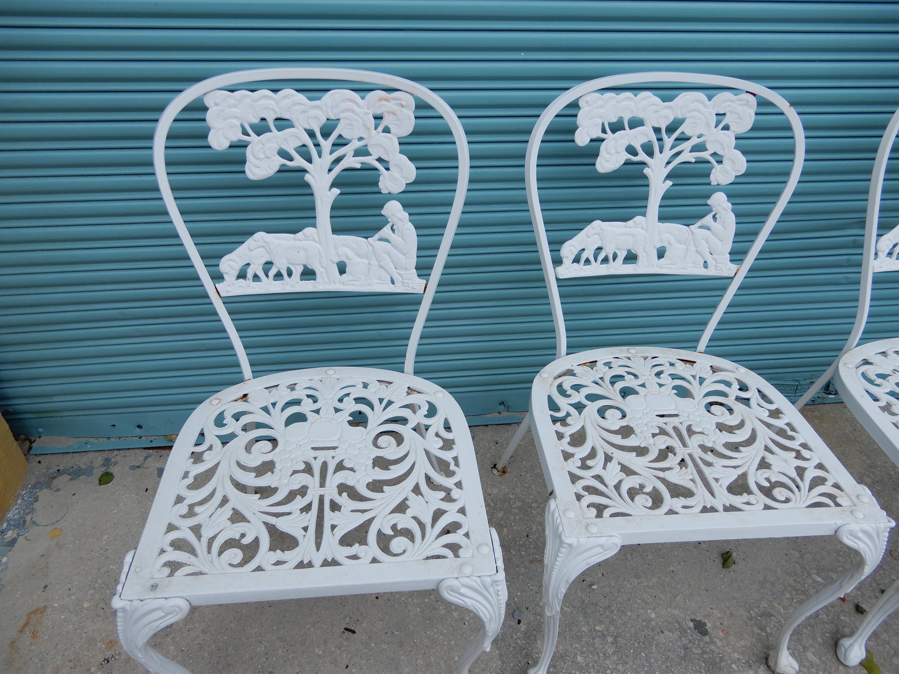 A set of 6 cast aluminum figural dining chairs. Molla who
worked on Long Island New York is best known for producing furniture in cast aluminum. The rare design of the chairs show a Shepard with his sheep sitting beneath a large tree. Molla is known