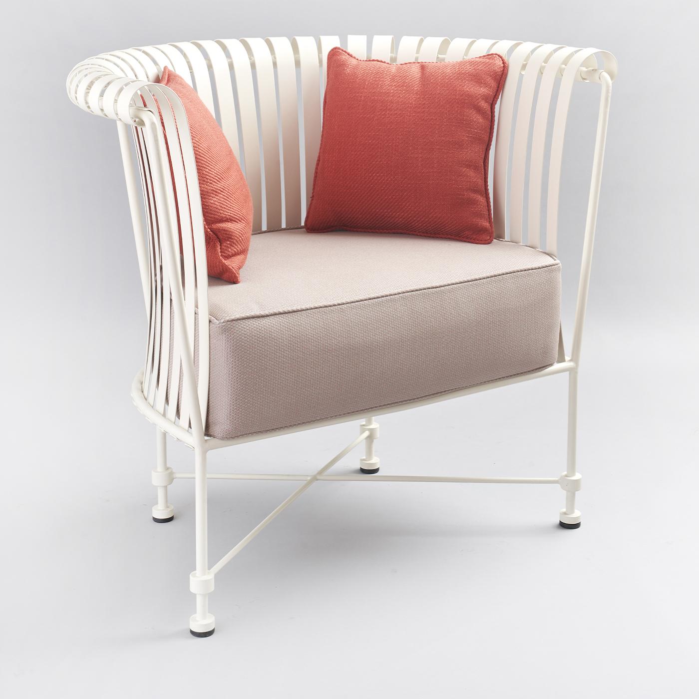 This armchair is made from hand-folded, galvanized, powder-coated, stainless steel. Made in Italy by expert artisans using historic techniques, its unique, multi-slatted back offers a blend of traditional Florentine craftsmanship with creative,
