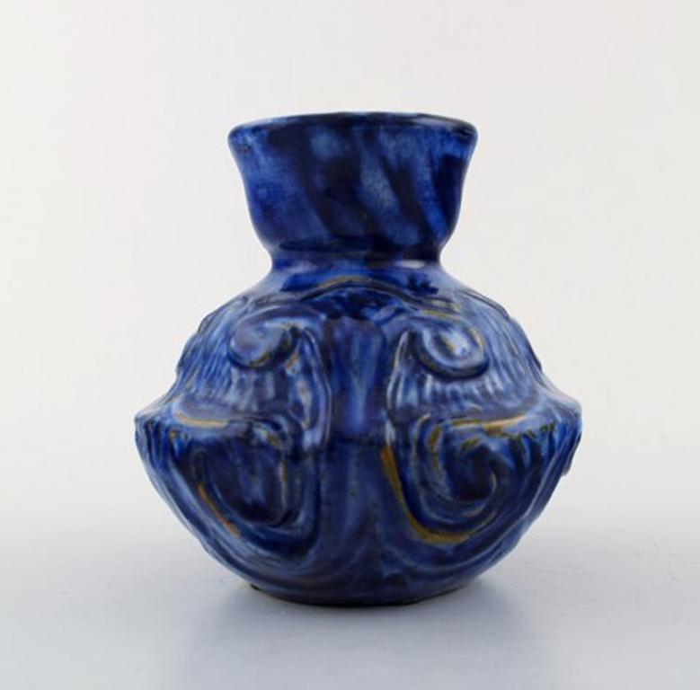 Moller & Bøgely Denmark, beautiful art nouveau vase of dark blue glazed ceramics,
circa 1920.
Large Danish private collection of Moller & Bøgely ceramics in stock.
Measures: 11.5 cm. x 11 cm.
In perfect condition.