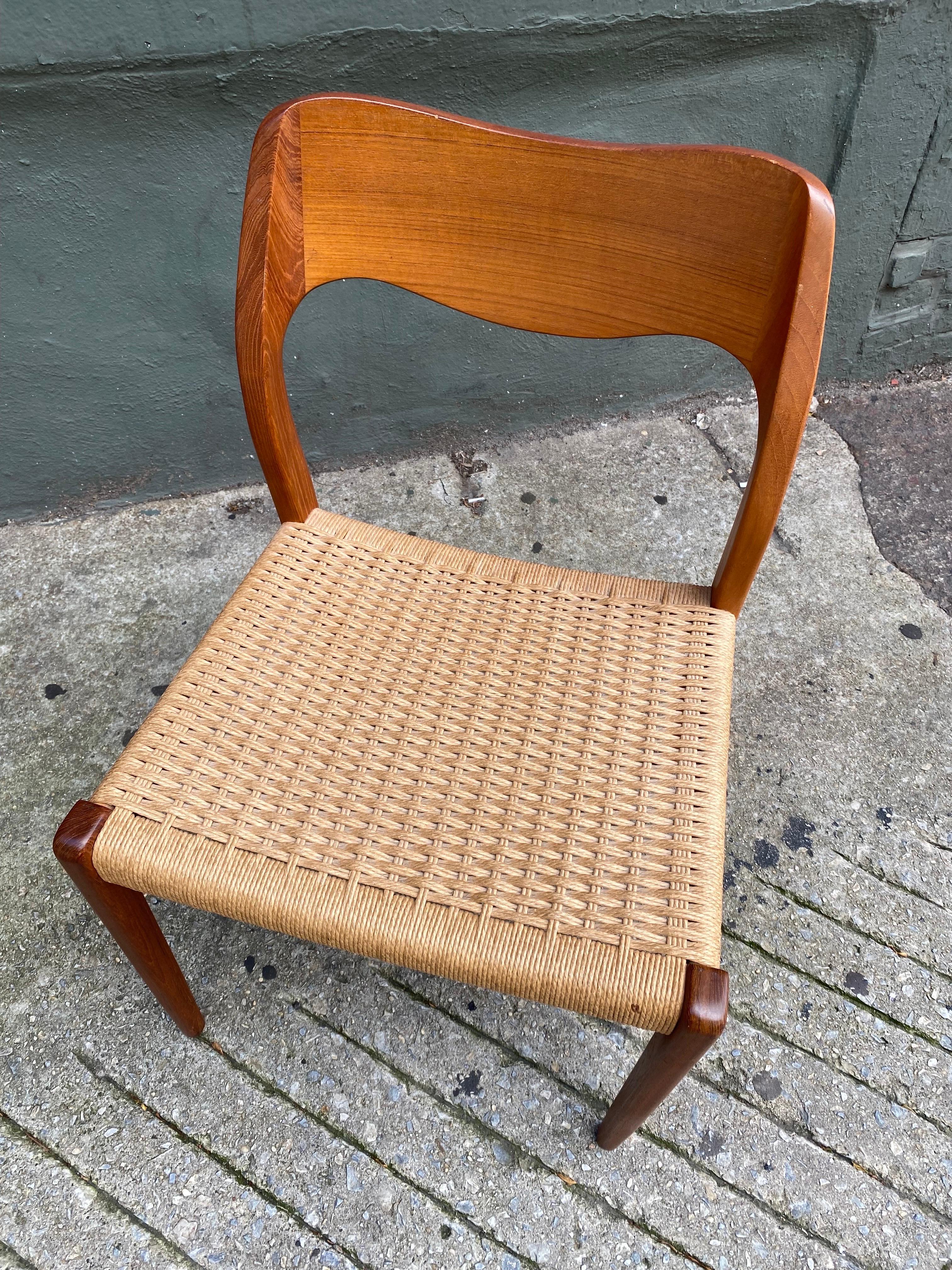 Moller Teak Dining Chair with papercord seat model 71.  Very clean example, wood very nice.  Retains label to underside.