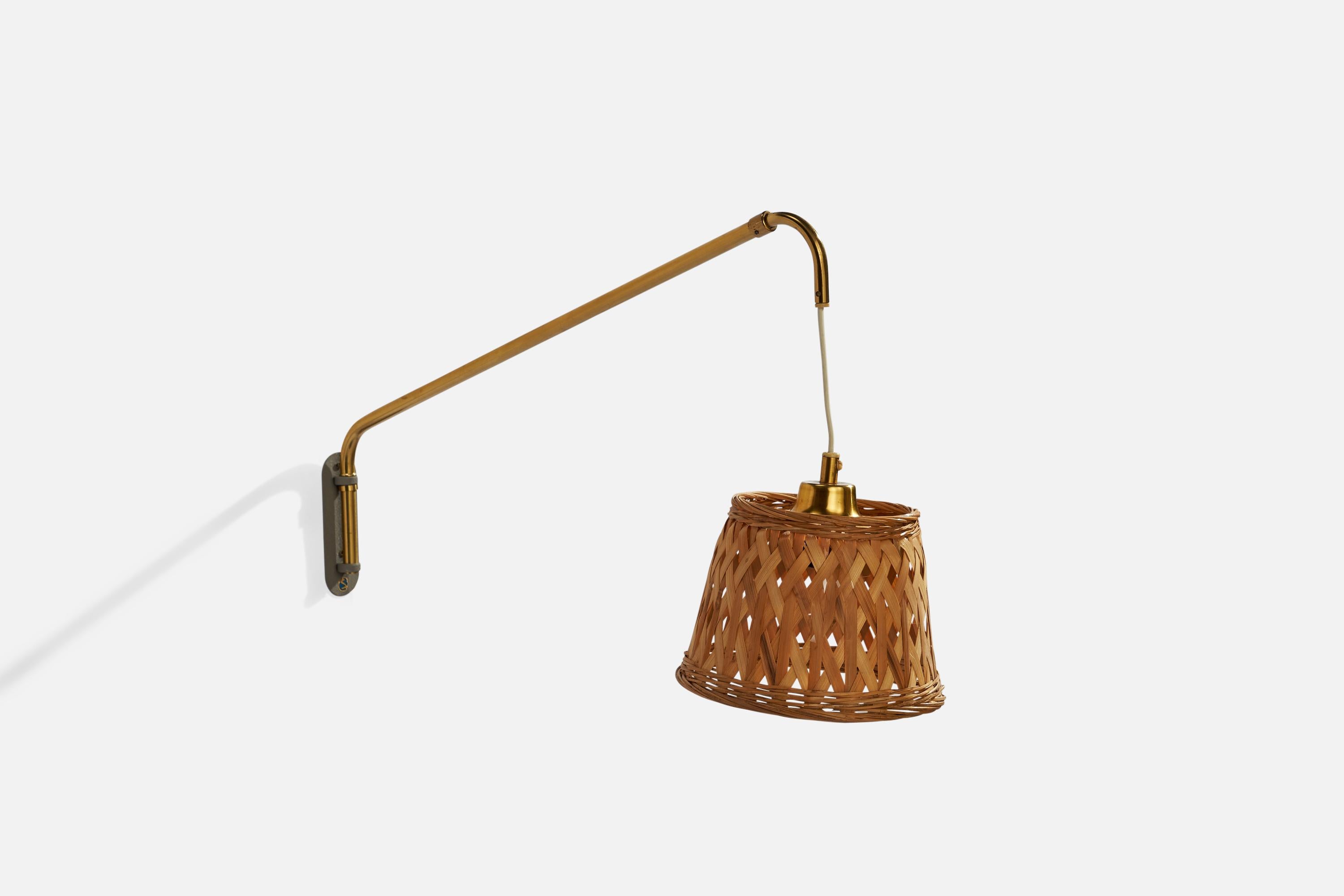 An adjustable brass and rattan wall light designed and produced by Möllers Armatur Elektriska, Sweden, 1940s.

Overall Dimensions (inches): 6.5”  H x 24”  W x 38.5” D
Back Plate Dimensions (inches): 4.75” H x 1.75”  W x .25”  D
Bulb Specifications: