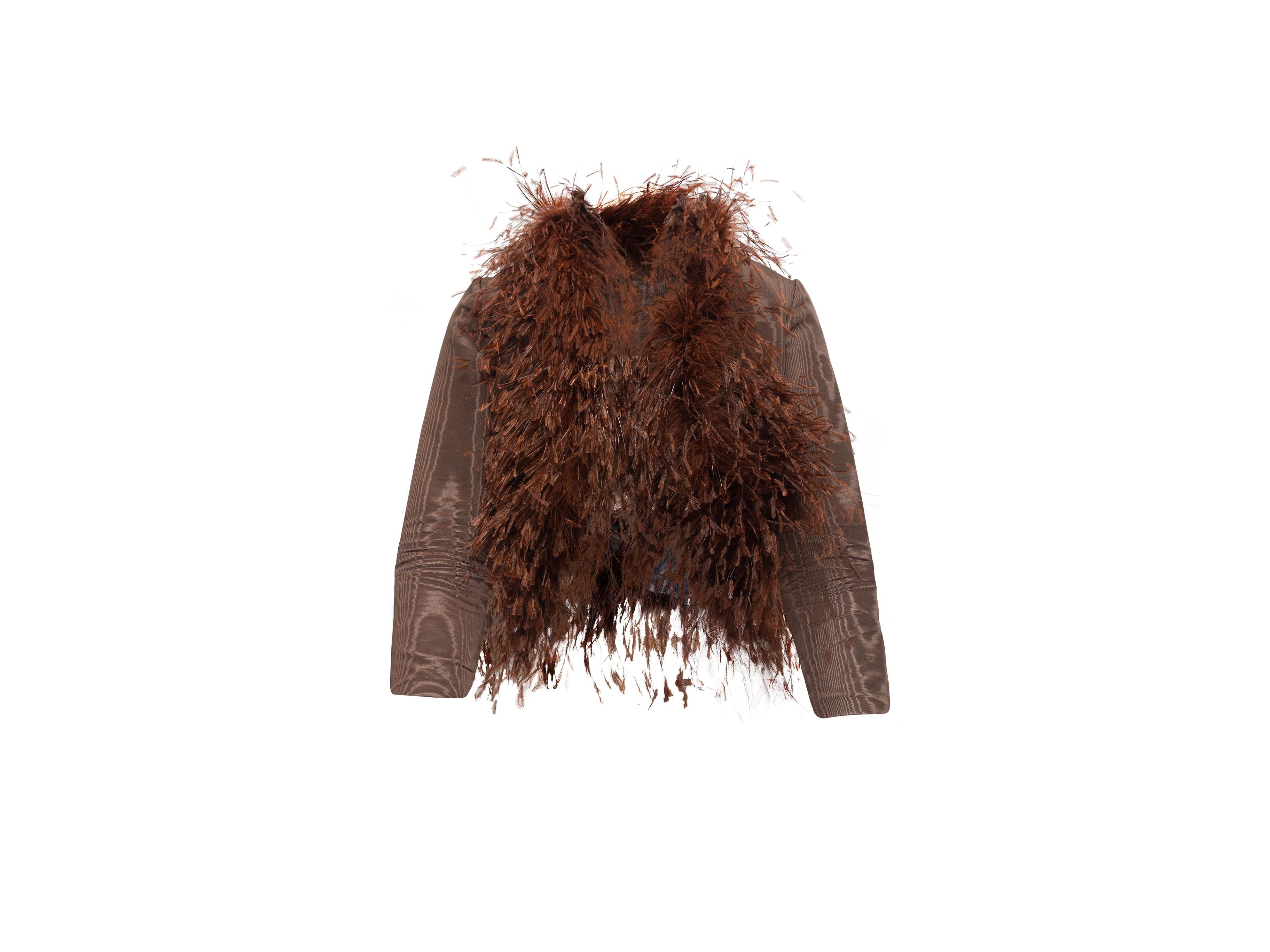 Product details: Vintage brown grosgrain and ostrich feather bolero by Mollie Parnis Boutique. Open front. 35