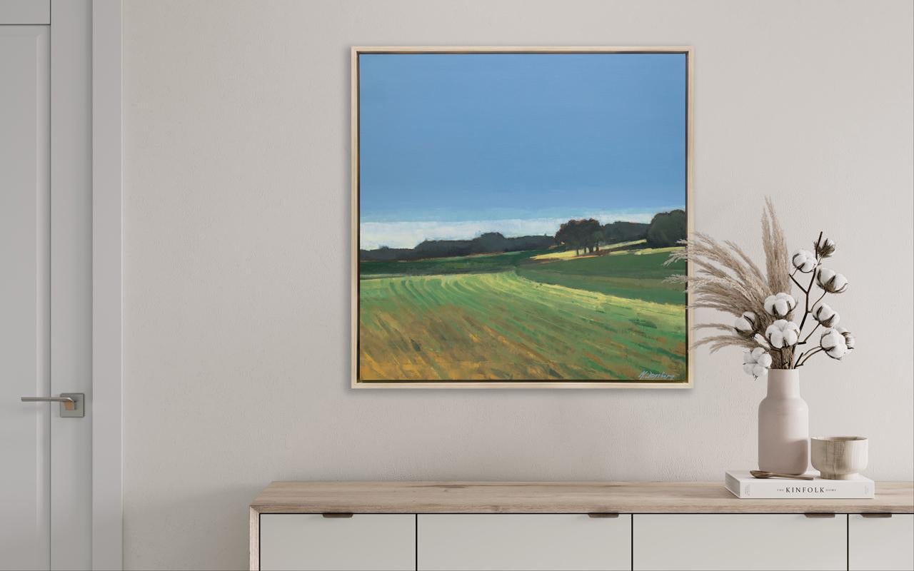 This Limited Edition giclee landscape print by Molly Doe Wensberg is an edition size of 195. It features a cool blue and green palette with warm yellow accents. The artist captures a scene of a field with lush foliage along the horizon beneath a