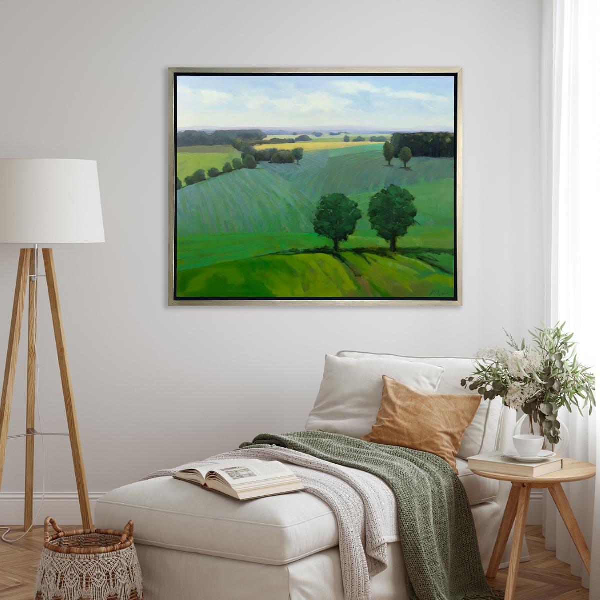 This Limited Edition giclee landscape print by Molly Doe Wensberg is an edition size of 195. It features a cool green palette with warm yellow accents, and captures a landscape scene with lush foliage and rolling hills. Printed on canvas, this