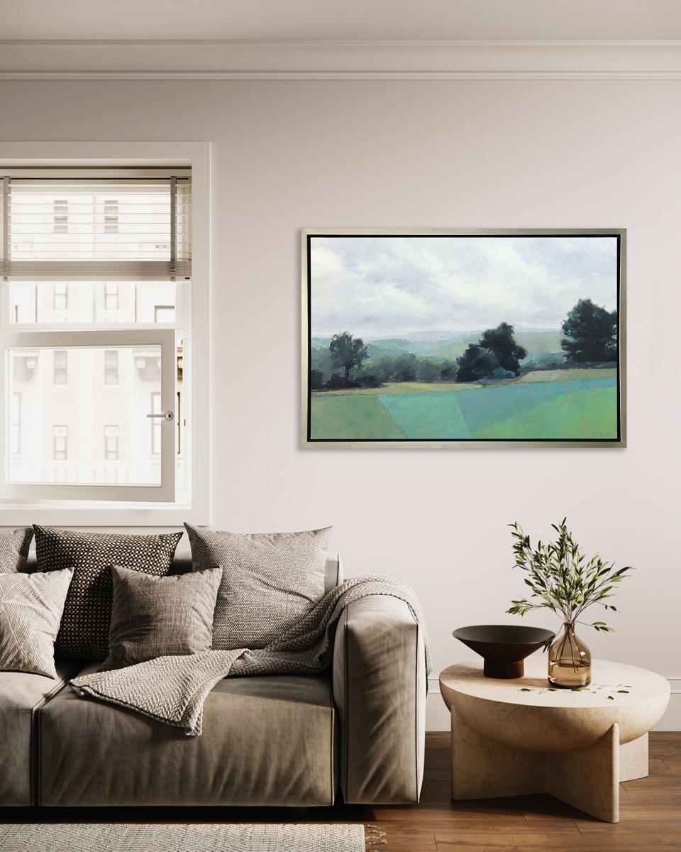 This Limited Edition giclee landscape print by Molly Doe Wensberg is an edition size of 195. It features a cool blue and green palette and captures a landscape scene with lush foliage and rolling hills, with certain areas of the grass abstracted