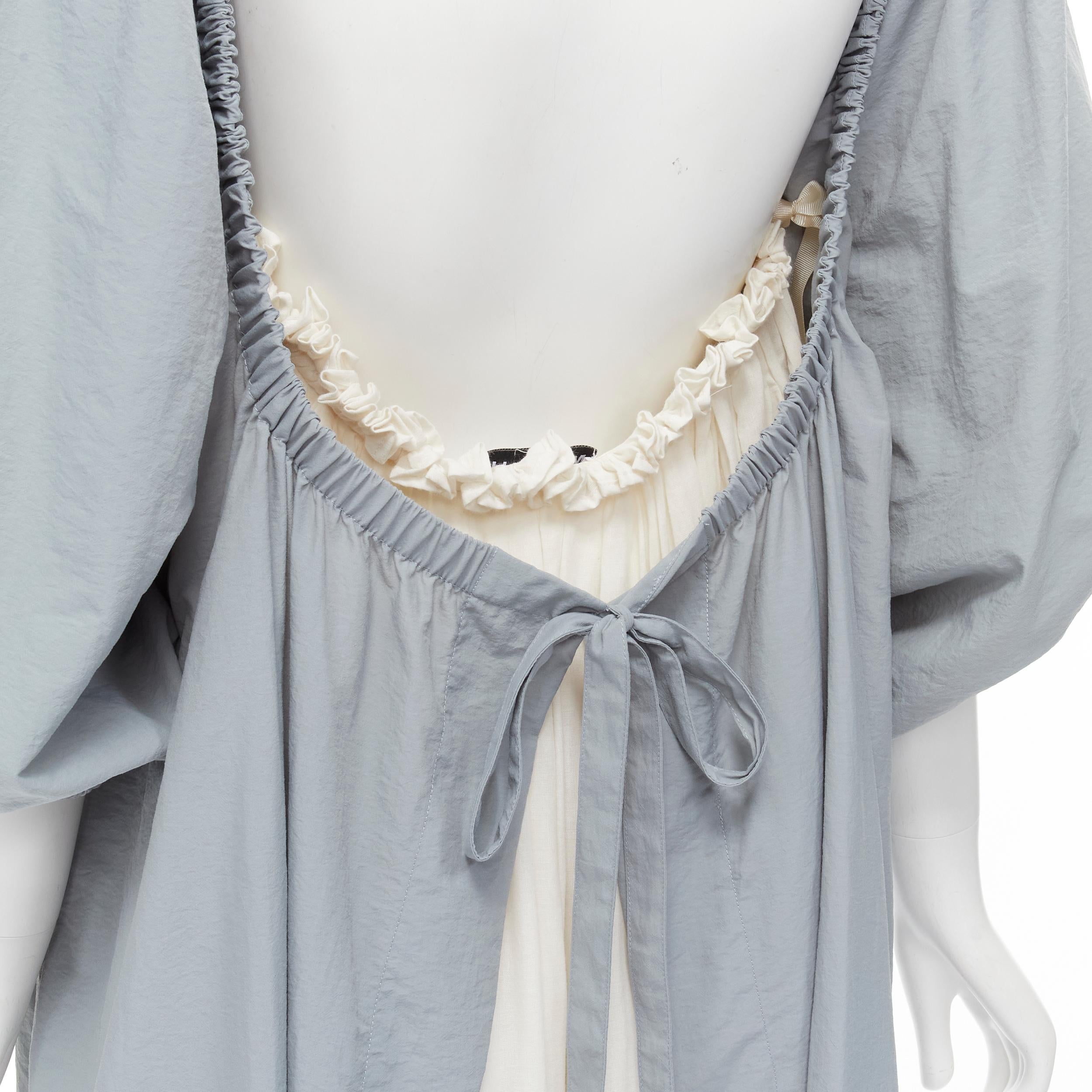 MOLLY GODDARD blue grey puff sleeve cream tie back midi dress UK8 S 
Reference: LNKO/A01885 
Brand: Molly Goddard 
Designer: Molly Goddard 
Material: Nylon 
Color: Blue 
Pattern: Solid 
Closure: Tie 
Extra Detail: Elasticated trim. Self tie straps.