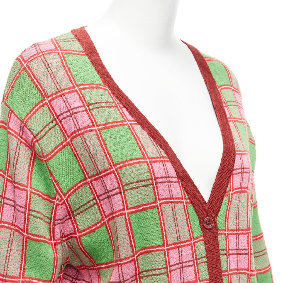 MOLLY GODDARD Emma green pink combed cotton checked intarsia cardigan L
Reference: DYTG/A00055
Brand: Molly Goddard
Material: Cotton
Color: Green, Red
Pattern: Checkered
Closure: Button
Extra Details: Molly Goddard's designs are often inspired by