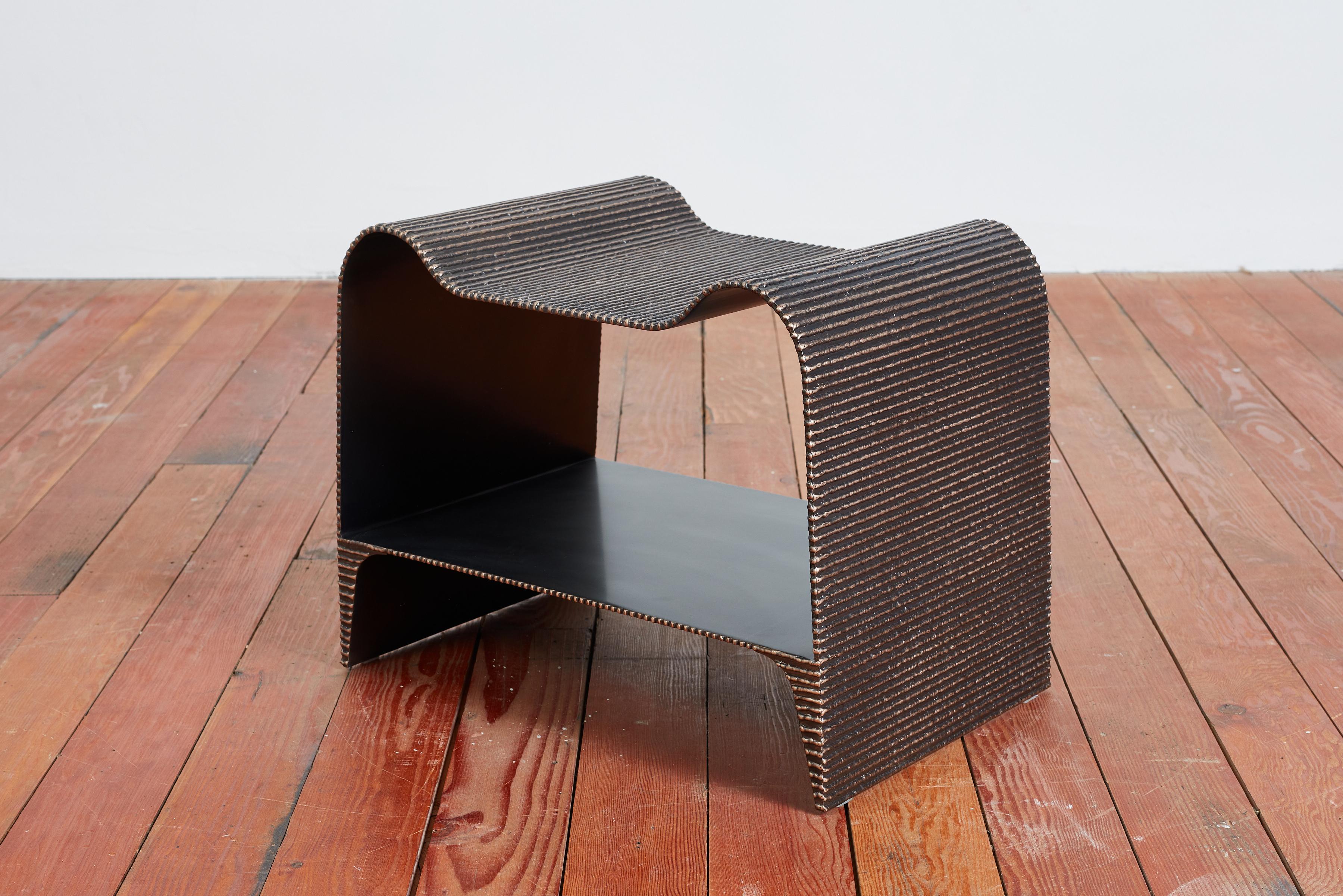 Molten End Table by William Emmerson
Dimensions: D 40,7 x W 59, 7x H 48,3 cm.
Materials: Bronze and steel.
 
William Emmerson's brilliantly designed 