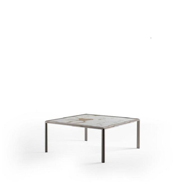 Jan Marble Coffee Table. 
Expert-crafted in Italy exclusively by Molteni&C.

Exclusive materials make this coffee table by Vincent Van Duysen a covetable piece. The marble top is made from calcatta gold sourced from the Apuan Alps in Italy, ensuring