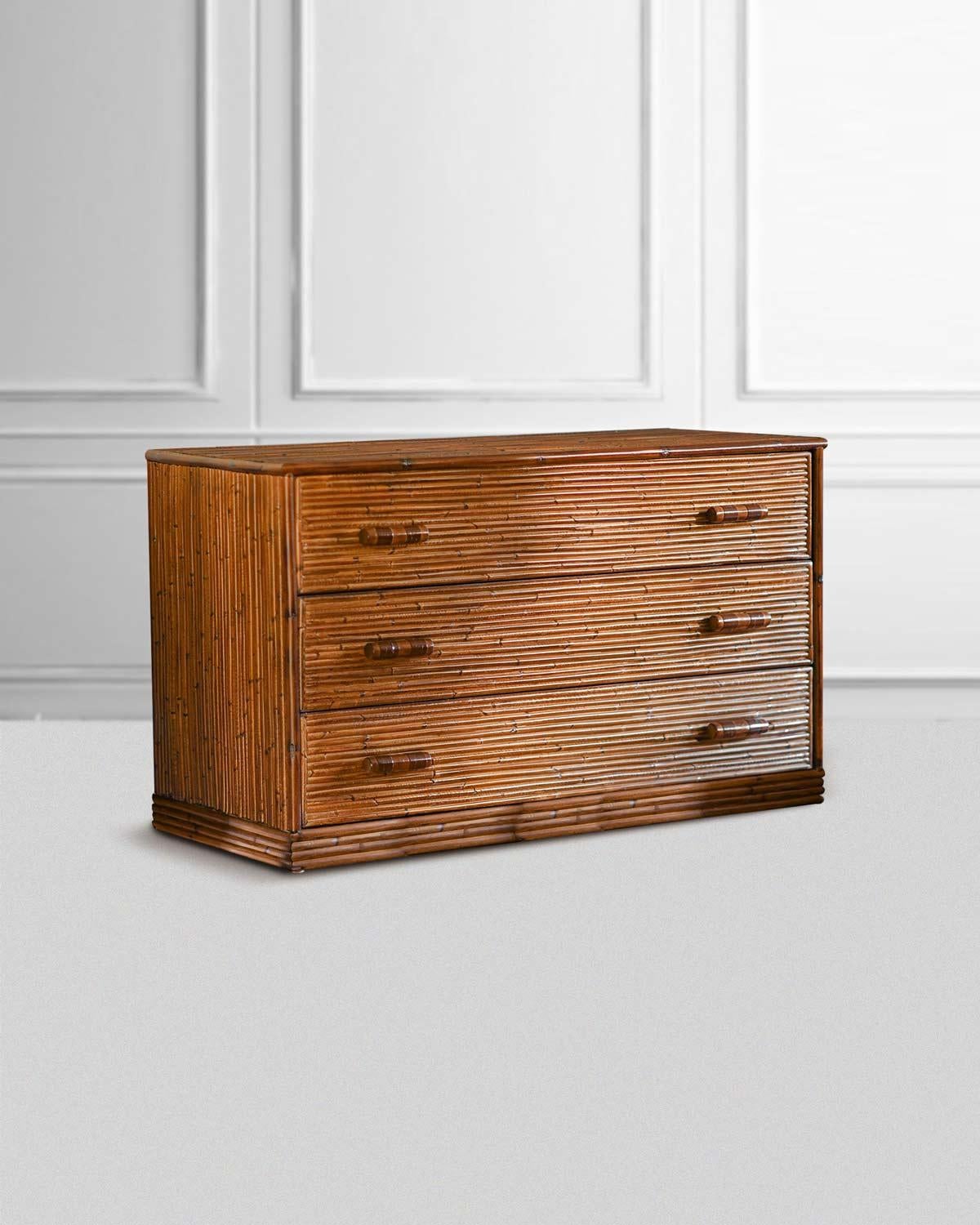 Bamboo chest of drawers with leather bindings. Italian artisanal production.
PRODUCT DETAILS
Dimensions: 104w x 73h x 46d cm
Materials: bamboo, leather
Production: Italian manufacturing