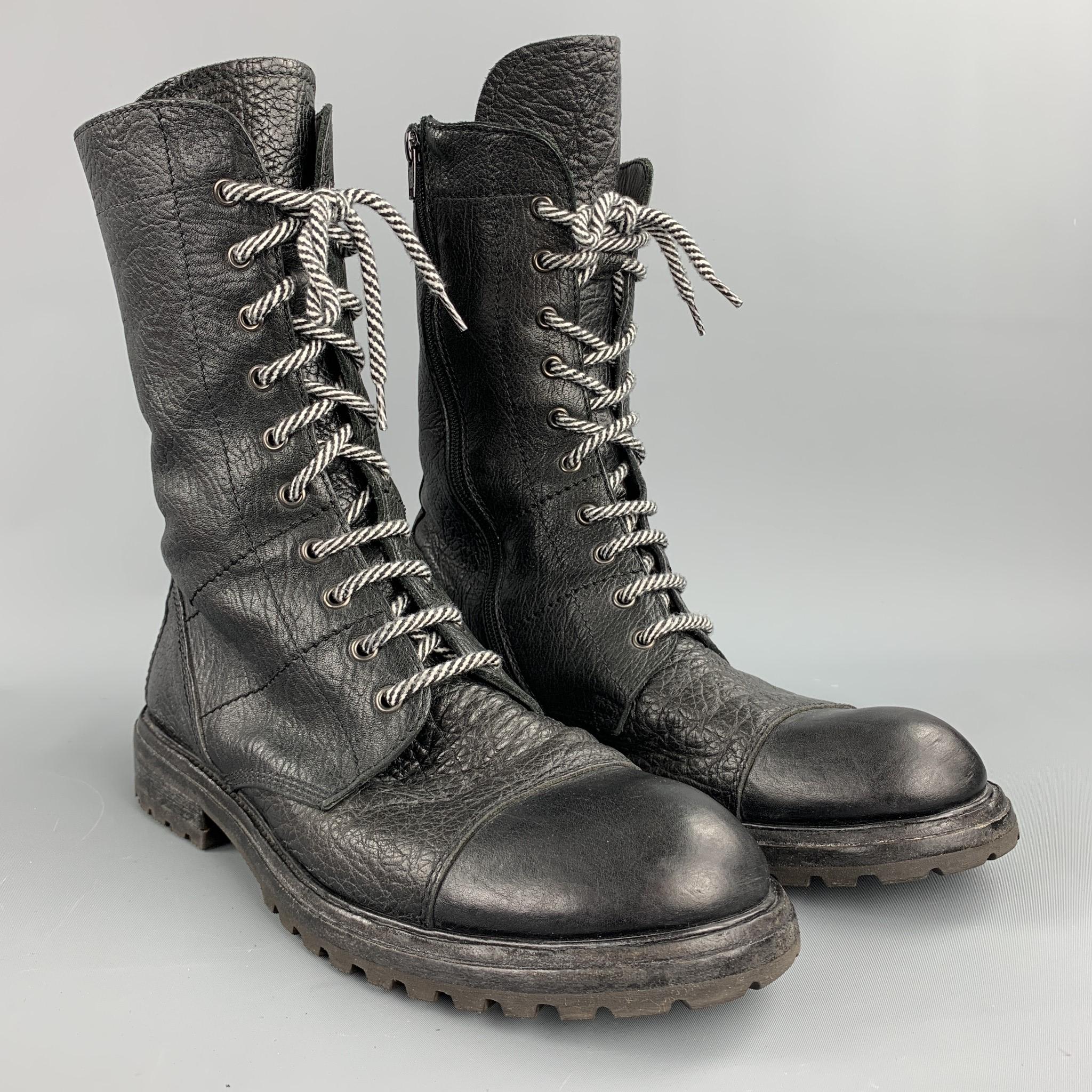 MOMA ankle boots comes in a black leather featuring a cap toe style, stitched details, rubber sole, and a lace up closure. Made in Italy.

Good Pre-Owned Condition.
Marked: EU 42

Measurements:

Length: 12.5 in.
Width: 4 in. 
Height: 10.5 in. 