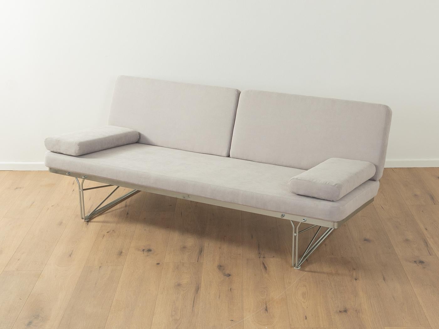 MOMENT Sofa by Niels Gammelgaard for Ikea from the 1980s with a galvanized steel frame. The sofa has been reupholstered and covered with a high-quality fabric in light grey.

Quality Features:

    very good workmanship
    high-quality materials
  