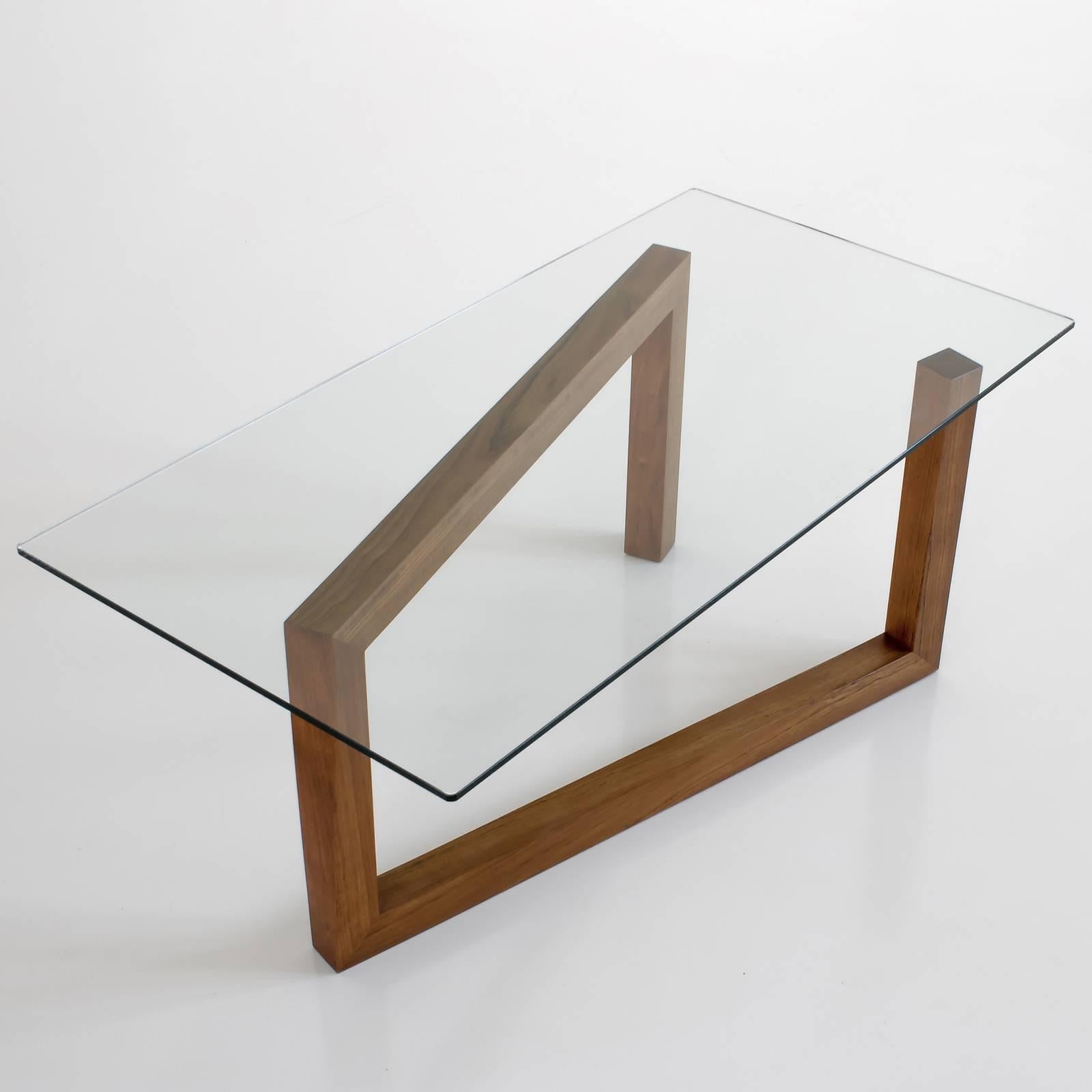Inspired by the iconic Noguchi table created by Japanese sculptor Isamu Noguchi, this remarkable coffee table strikes a perfect balance between art and design. Made of a single piece of solid wood, the zigzag-shaped base supports a rectangular,