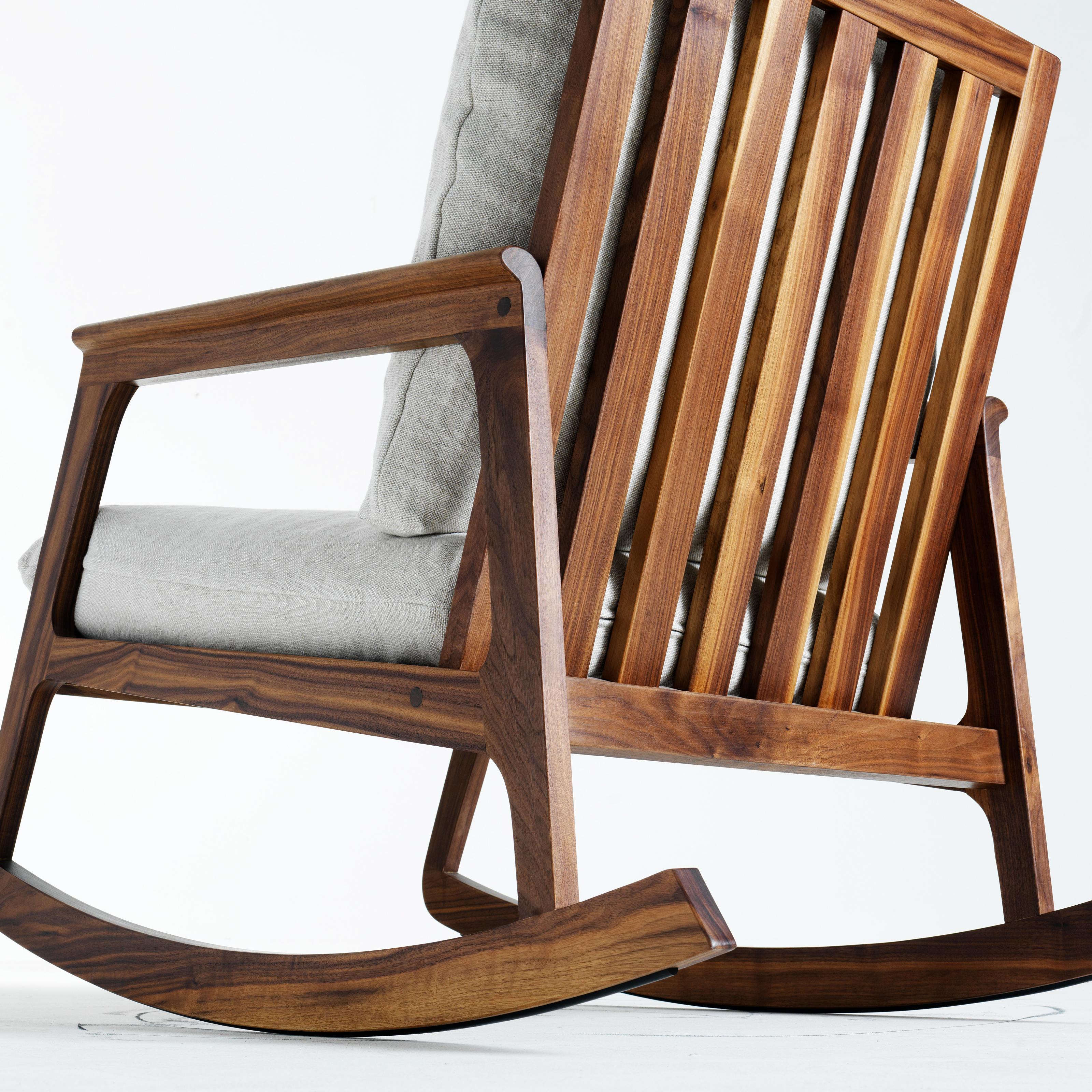 Momento Rocking Chair by Dale Italia
Dimensions: D 98 x W 67 x H 89 cm.
Materials: Walnut and upholstery.

Rocking chair in solid Canaletto walnut. Available in two finishes: natural and grey walnut. Different upholstery materials are available on