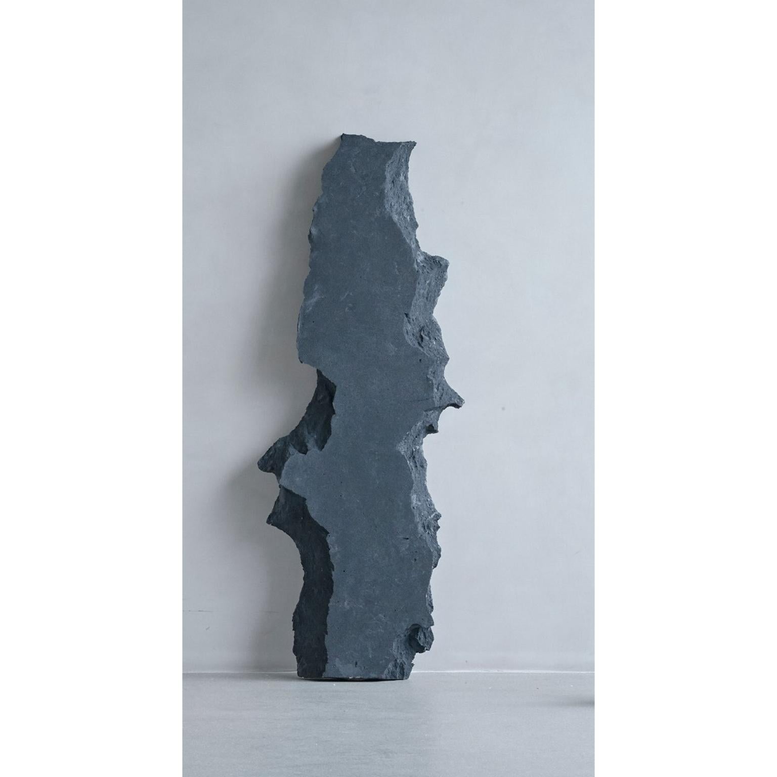Momentum sculpture by Andredottir & Bobek
Dimensions: L 1400 x B 320 x H 120 cm 
Materials: Reused Foam/Mattress and Jesmontite Hardner in color dark gray.

Our work aims to encourage art and design as symbiotic disciplines, giving us as performers