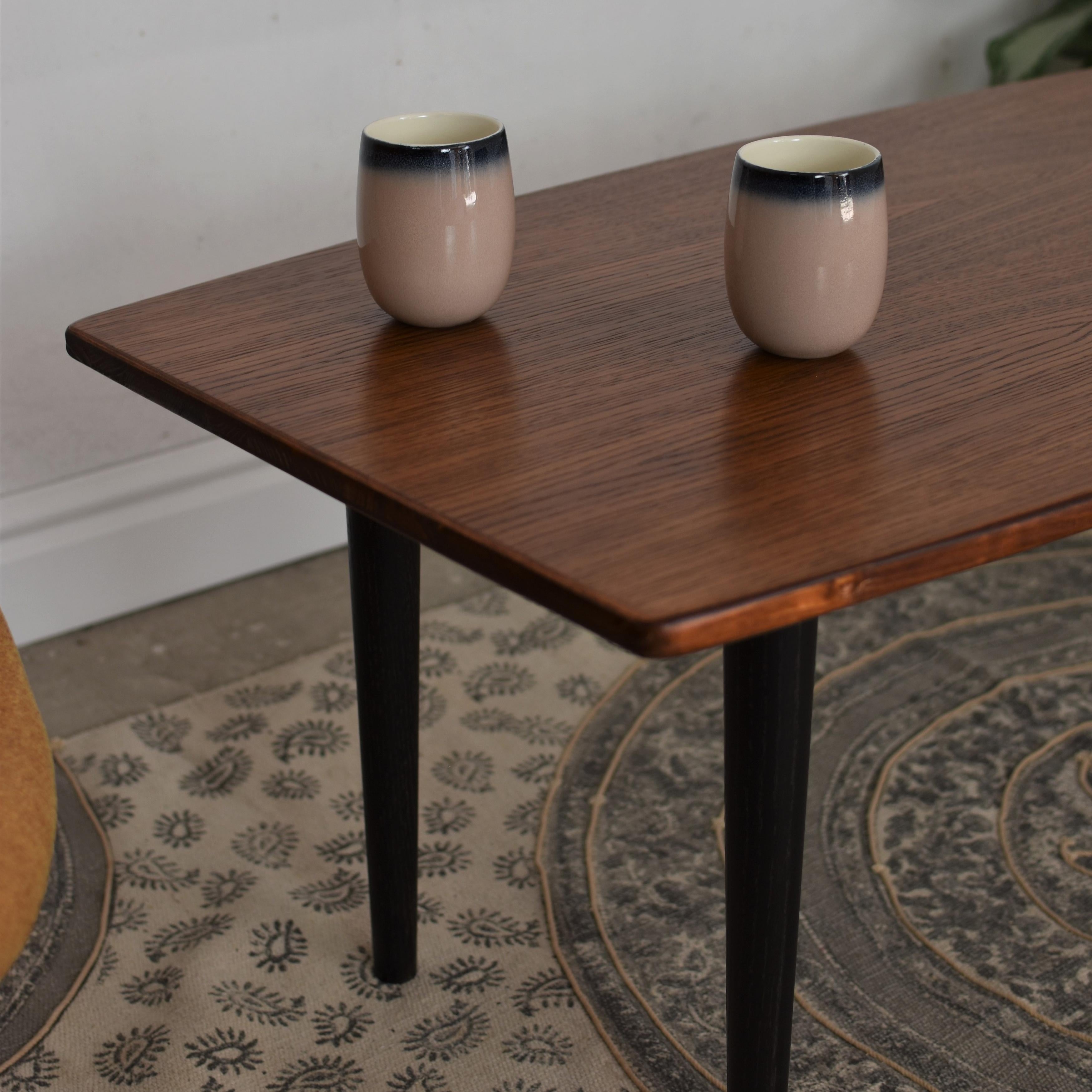 Mon Coffee Table by Pastform
Dimensions: D 57 x W 115 x H 42 cm.
Materials: Stained and varnished wood.

Available in different wood color finishes: Whiskey, Rum, BPA, Nobel, Brandy, Schwarz, and Natura. Please contact us.

Rooted in a good