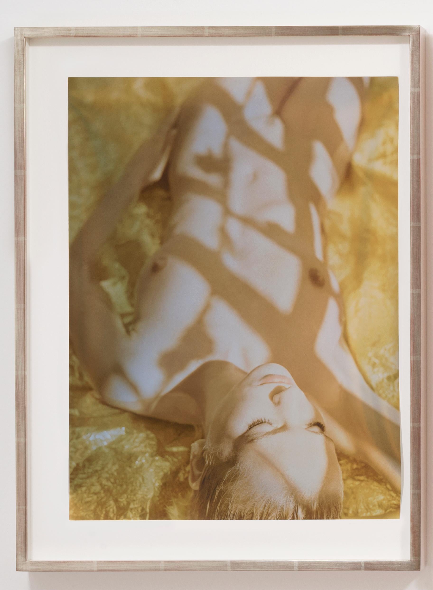 Mona Kuhn, Acido Dorado: Illusions, 2014 was photographed at architect Robert Stone's secluded glass house located in California's Mojave Desert near Joshua Tree. Inspired by the early autumn light and elongated shadows in the desert at the